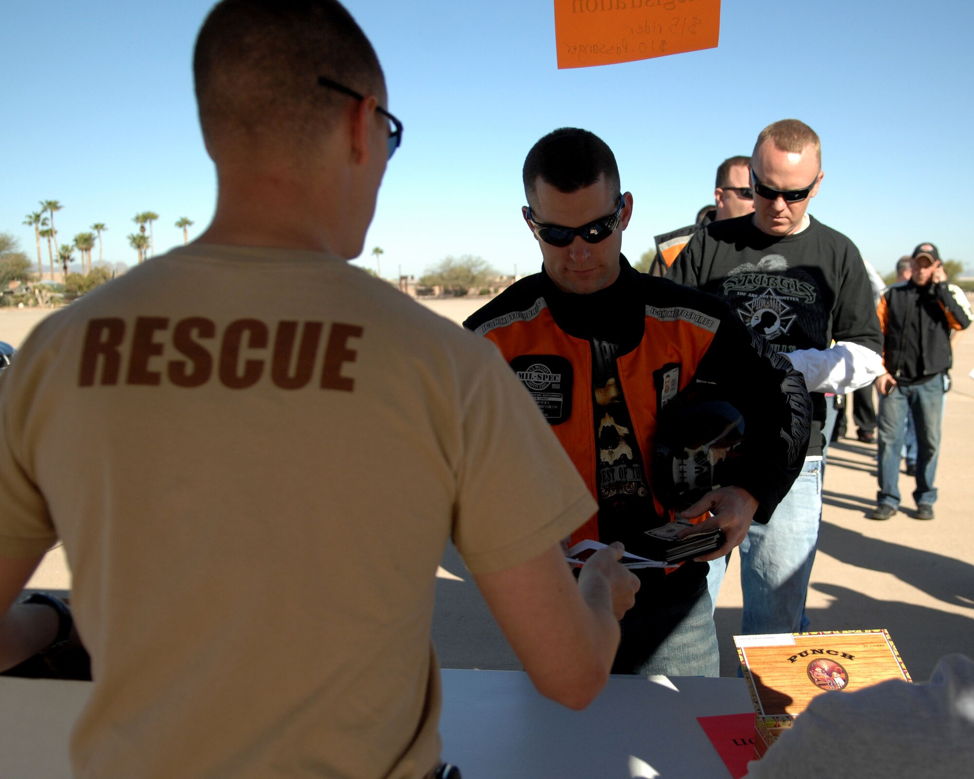 Participants of the first Angel Thunder Poker Run event wait in line to register at Heritage Park here April 9. More than 60 motorcycle riders from around the nation participated in this event benefiting the “That Others May Live Foundation.” The event, sponsored by the 55th Rescue Squadron Booster Club, kicked off the Angel Thunder 2010 personnel recovery exercise and raised $1,800 for TOML, a charity that provides social and financial support to families of fallen search and rescue personnel. (U.S. Air Force photo/Staff Sgt. Alesia Goosic)