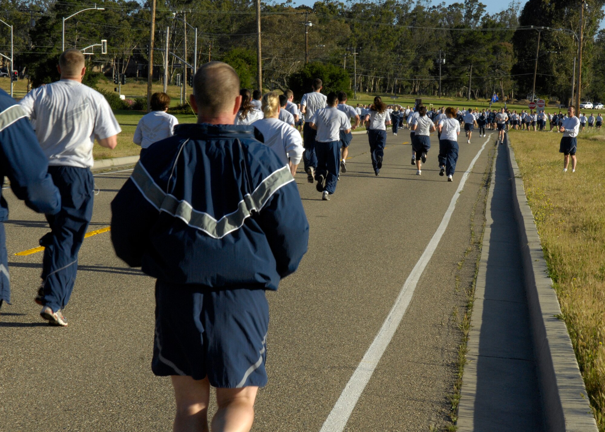 VANDENBERG AIR FORCE BASE, Calif. – Members of Team V race for the finish line during the Fit-to-Fight Run here Friday, April 30, 2010. The run is Vandenberg’s way of holding its Airmen to a high standard of physical fitness each month. (U.S. Air Force photo/Airman 1st Class Lael Huss)