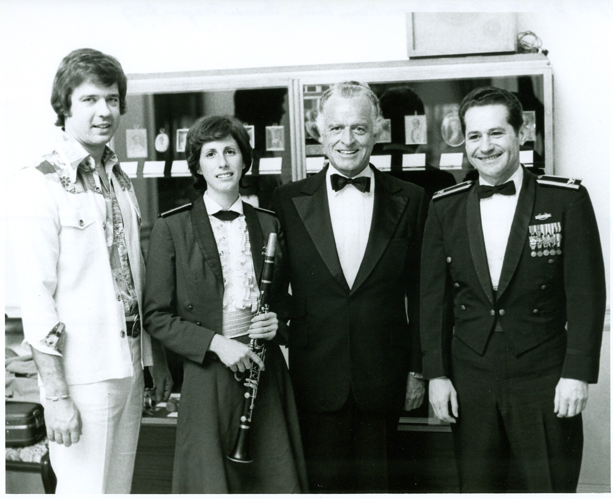Left to Right: Tom Gauger (announcer on WMAL), Technical Sgt. Karen Erler, Carmen Dragon, Colonel Arnald D. Gabriel in the Green Room at Constitution Hall for a Guest Artist Series Performance. If you have any other stories you can share about the event, please email our Band Historian <a href="mailto:usafbandhistorian@afncr.af.mil">Technical Sgt. Tracey MacDonald</a>. Thank you and we look forward to hearing from you!  This is Photo 30. (Unknown Photographer)

