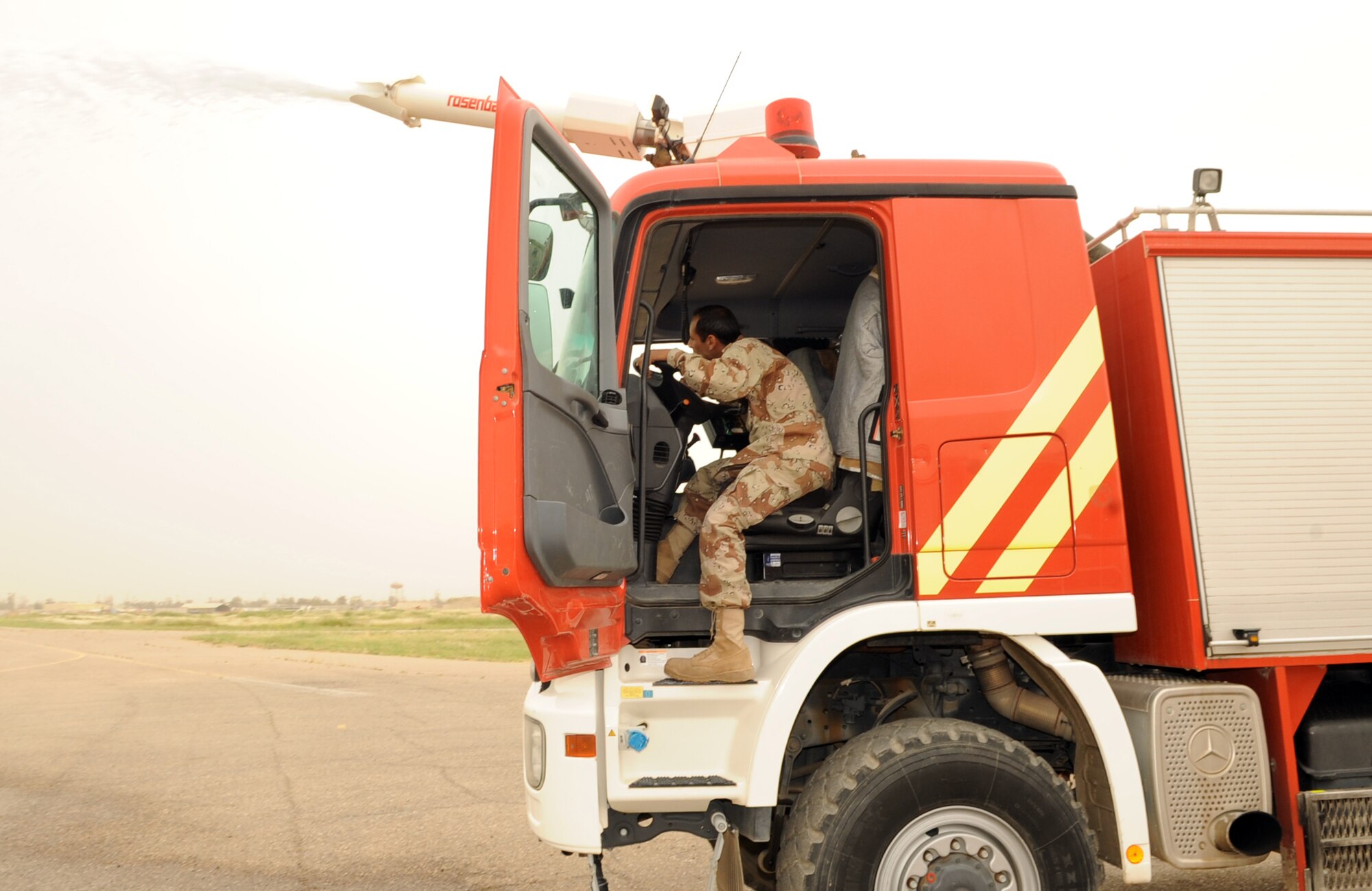 506th Air Expeditionary Group and Iraq Training and Advisory Mission members facilitated a maintenance education day between the Province of Kirkuk Fire Department and the Iraq air force fire department April 12, 2010, at Kirkuk Regional Air Base, Iraq. (U.S. Air Force photo/Staff Sgt. Tabitha Kuykendall)