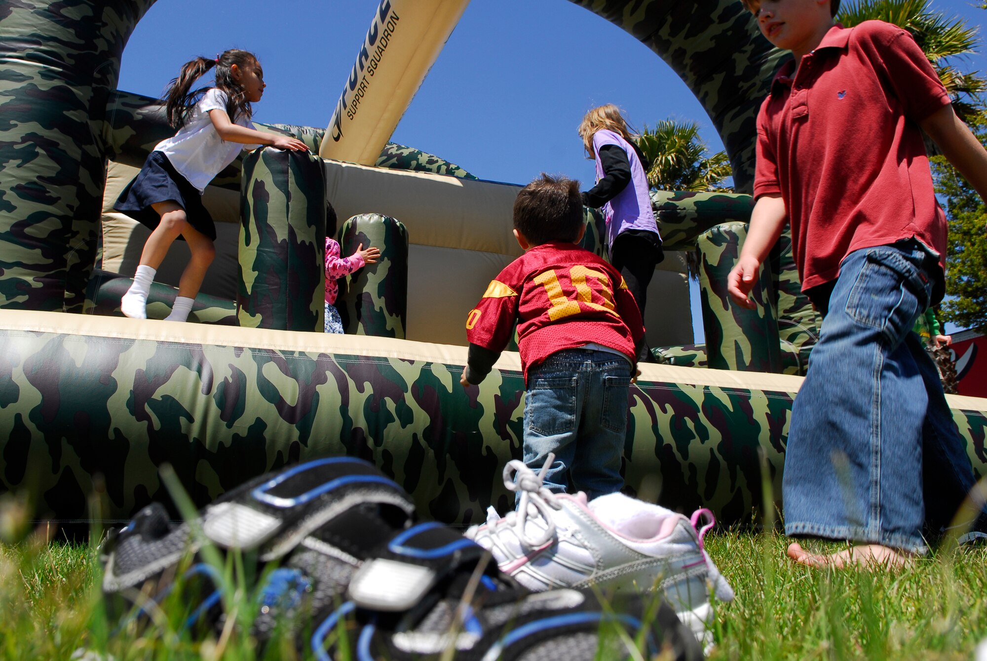VANDENBERG AIR FORCE BASE, Calif. -- Dependents on base bounce around the obstacle course during Vandenberg's 10th Annual Earth Day event in front of the base library here Wednesday, April 28, 2010. (U.S. Air Force photo/Senior Airman Andrew Satran) 

 

 
 

 

 

 

 
