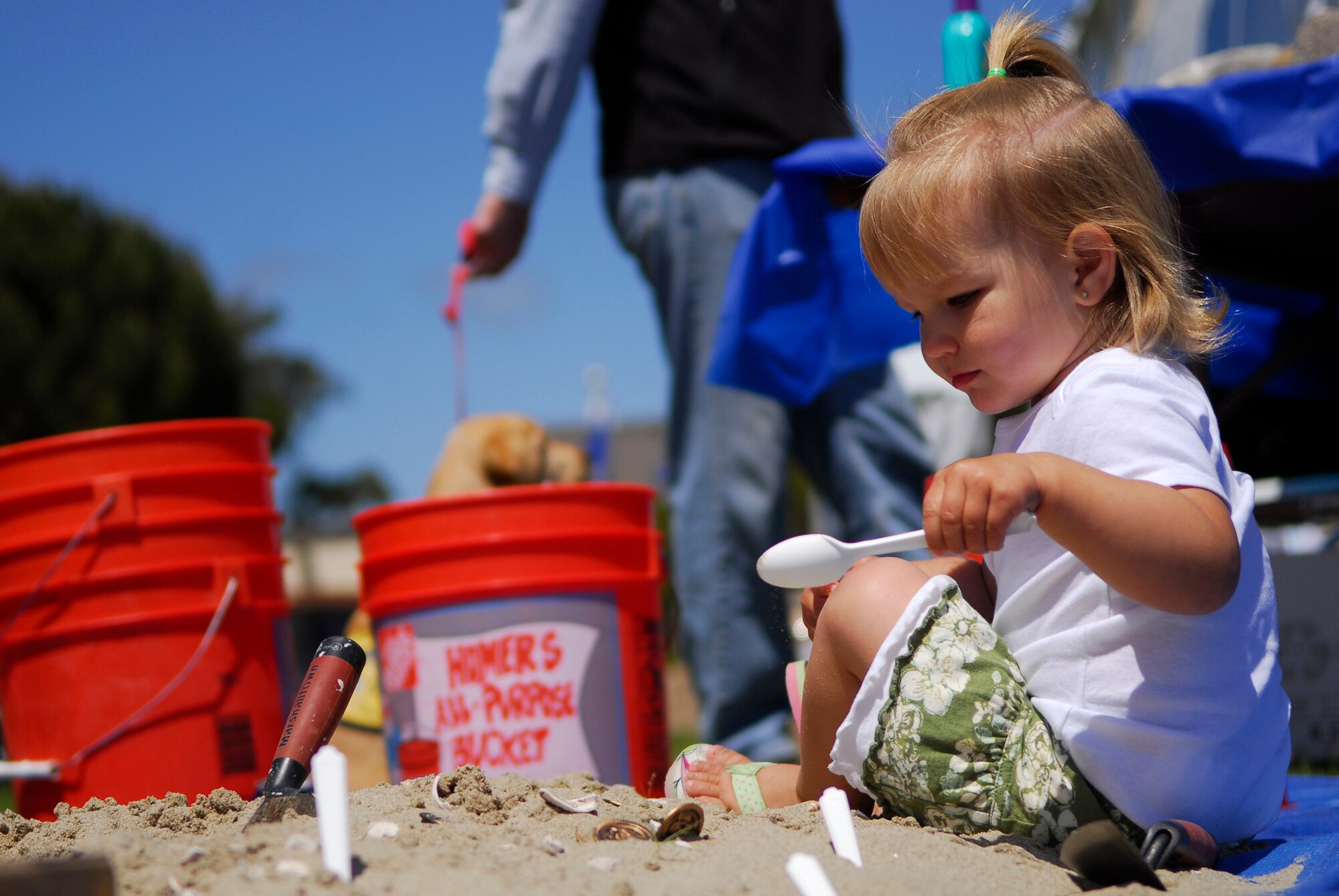 VANDENBERG AIR FORCE BASE, Calif. -- Excavating the earth beneath her, MacKenzie Corral searches for shells and stones during Vandenberg's 10th Annual Earth Day event in front of the base library here Wednesday, April 29, 2010. Base archeologists have excavated sites around Vandenberg for remnants of shells and stones to understand how people used to live thousands of years ago.  (U.S. Air Force photo/Senior Airman Andrew Satran) 

 

 