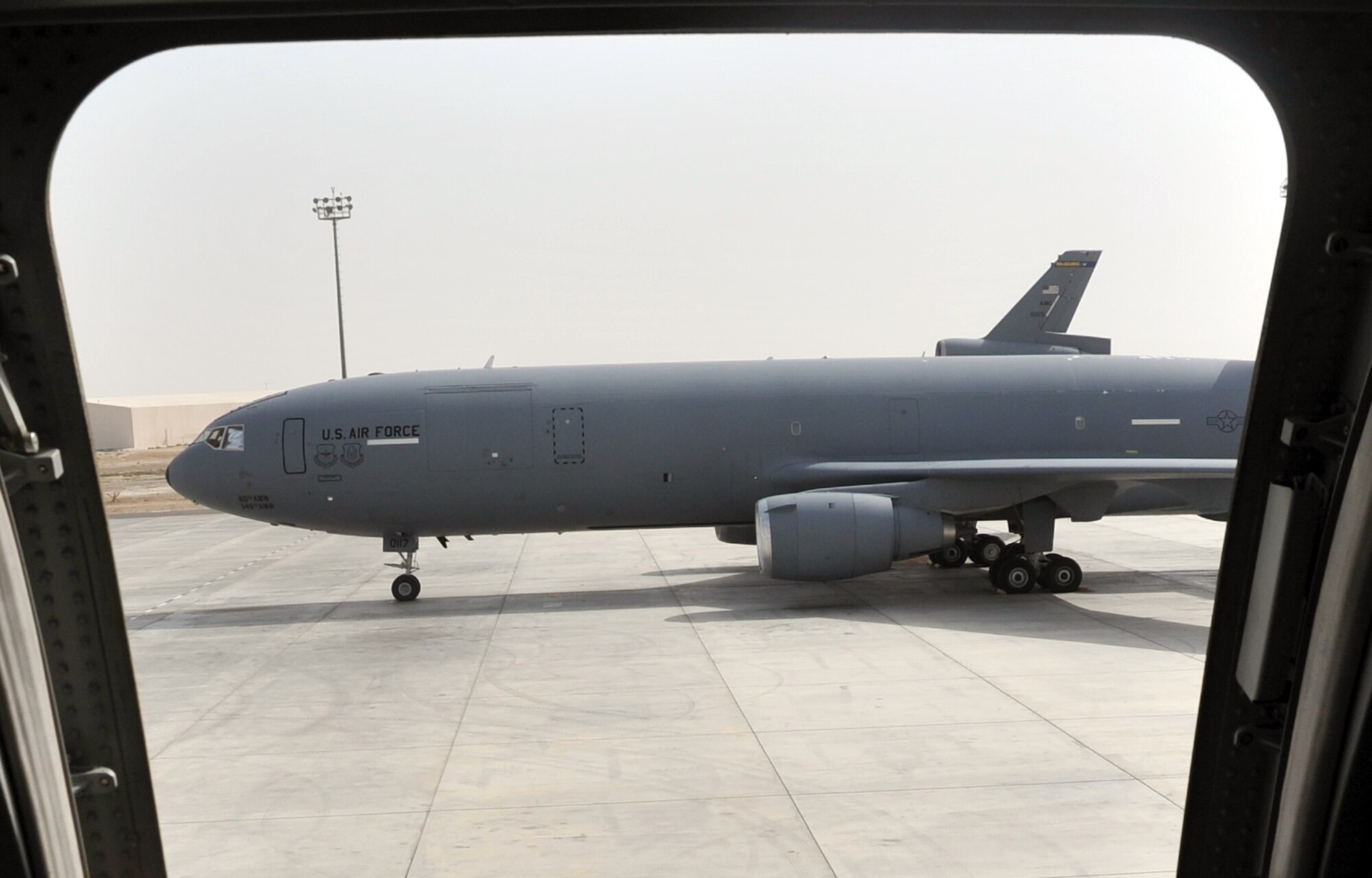 A KC-10 Extender is parked on the flightline for the 380th Air Expeditionary Wing at a non-disclosed base in Southwest Asia on April 24, 2010. KC-10s and the maintenance Airmen who support them deployed to the 380th AEW are a part of the 908th Expeditionary Air Refueling Squadron and the 380th Expeditionary Aircraft Maintenance Squadron and are deployed from Joint Base McGuire-Dix-Lakehurst, N.J., and Travis Air Force Base, Calif. (U.S. Air Force Photo/Master Sgt. Scott T. Sturkol/Released)