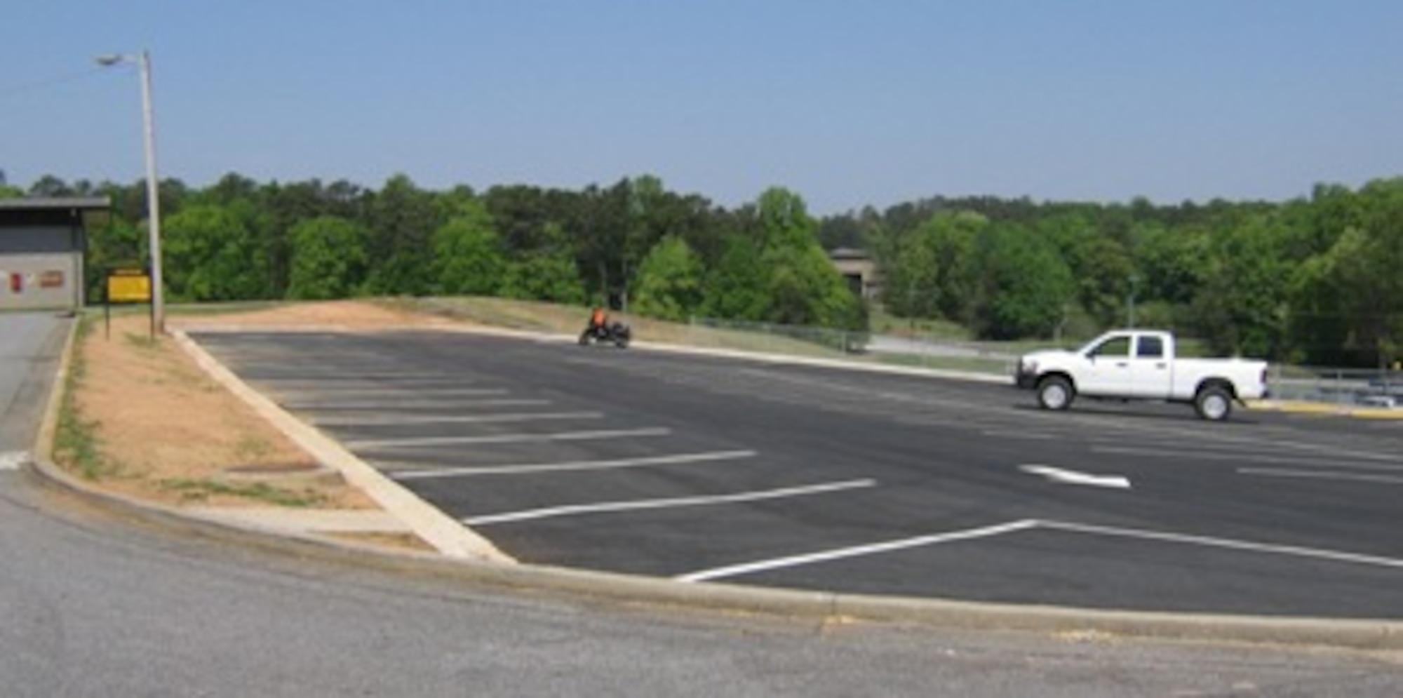A new parking lot was recently completed for personnel assigned to the Base Fire Station (B745), C-130 Inspection Dock Hanger (B746), and Transportation Proficiency Center (B747). The new asphalt paved parking lot provides 45 additional parking spaces. 