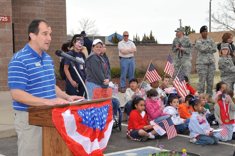 BUCKLEY AIR FORCE BASE, Colo. -- Tom Cox, 460th Force Support Squadron, offers closing remarks during the Month of the Military Child kick-off ceremony March 31. (U.S. photo by Airman 1st Class Paul Labbe)