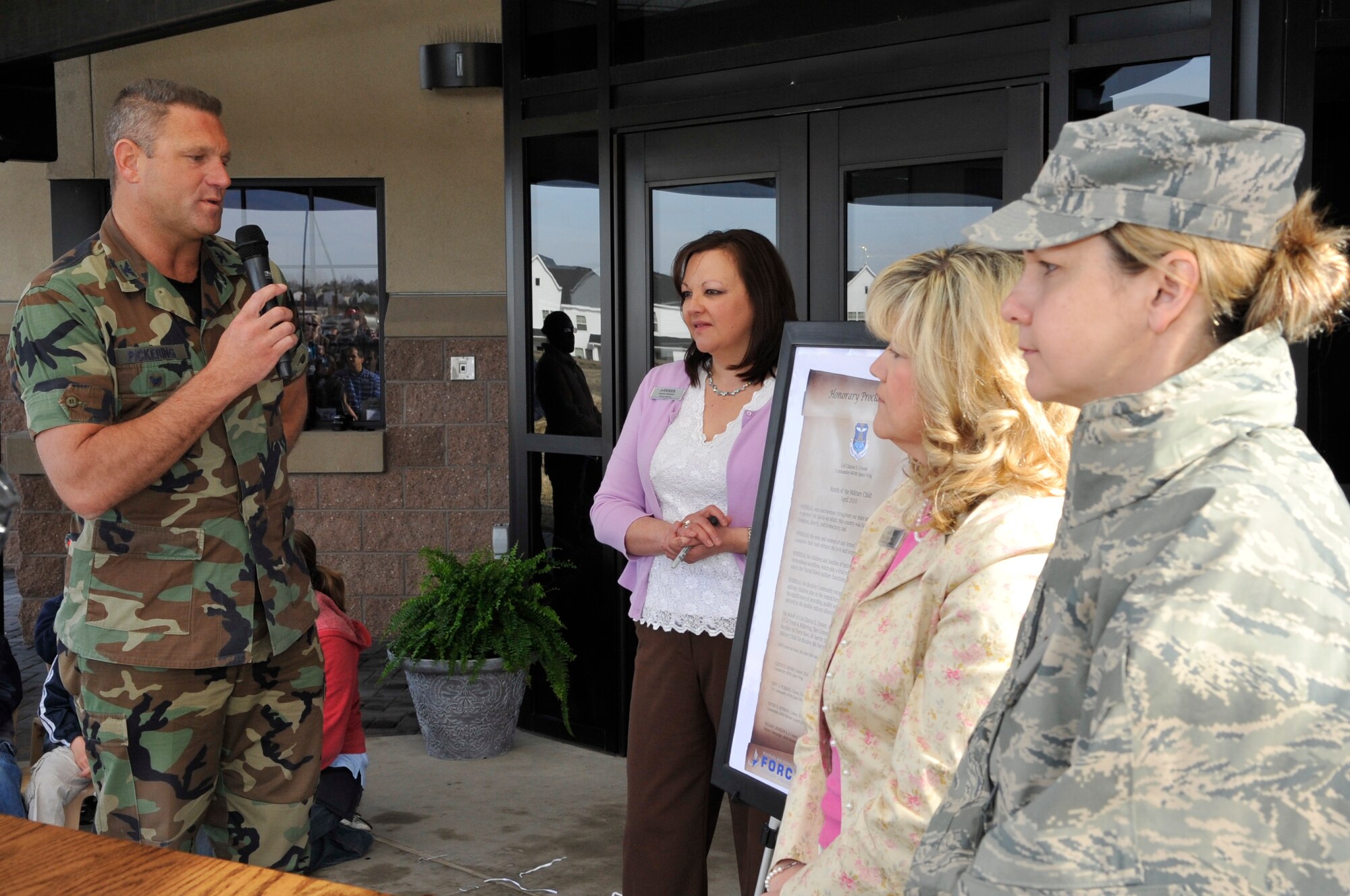 BUCKLEY AIR FORCE BASE, Colo. -- Col. Trent Pickering, 460th Space Wing vice commander, gives the opening remarks during the Month of the Military Child opening ceremony March 31. (U.S. photo by Airman 1st Class Paul Labbe)