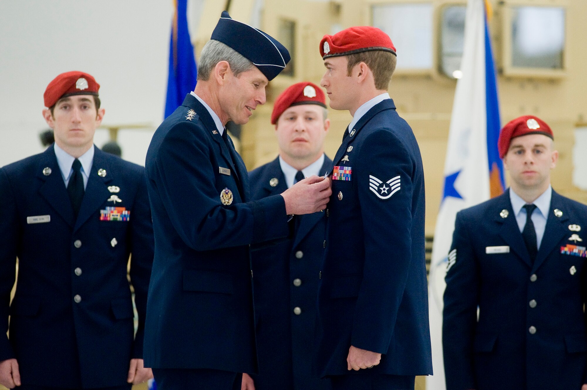 Air Force Chief of Staff Gen. Norton Schwartz pins the Silver Star on Staff Sgt. Evan Jones during a medal ceremony April 29, 2010, at Joint Base Lewis-McChord, Wash. Sergeant Jones received both a Silver Star and a Bronze Star with
Valor for two separate incidents during a deployment to Afghanistan in 2008. (U.S. Air Force photo/Abner Guzman)