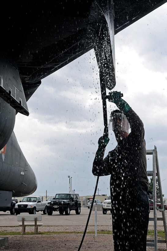 ELLSWORTH AIR FORCE BASE, S.D. – Tech. Sgt. Todd Rajek, 28th Security Forces Squadron standardization and evaluations manager, uses a power washer to clean an F-111 Aardvark at the South Dakota Air and Space Museum, April 28. The museum will be hosting a visitor appreciation day on May 1 from 8:30 a.m. to 4:00 p.m. (U.S. Air Force photo/Airman 1st Class Matthew Flynn)
