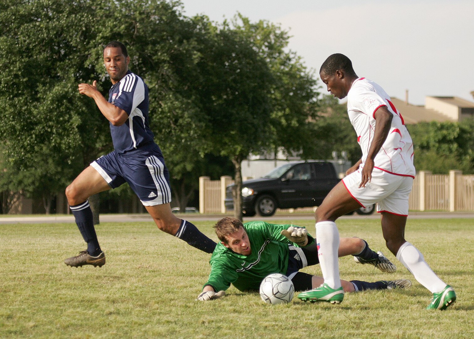 Warhawks goalie Chris Phillips and defender Andre Scott try to recover on a Haitian fast break April 26.