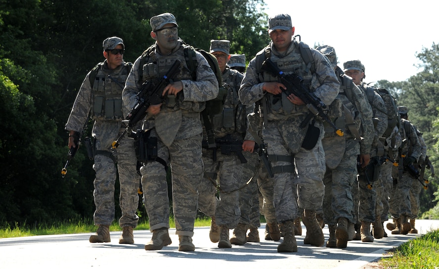 MOODY AIR FORCE BASE, Ga. -- Members from the 822nd Security Forces Squadron ruck march from one training exercise to another here April 27. The 822nd SFS train to remain current in case they are tasked to deploy. (U.S. Air Force photo by Airman 1st Class Benjamin Wiseman/RELEASED)