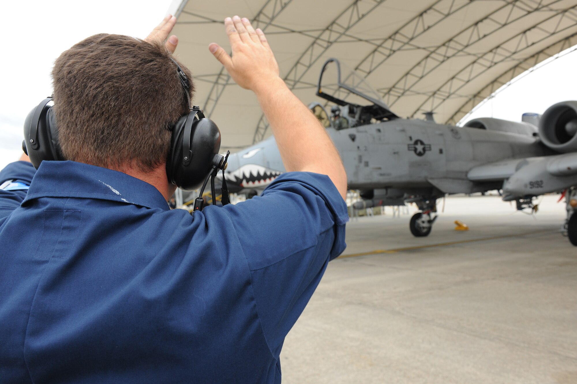 MOODY AIR FORCE BASE, Ga. -- Tech. Sergeant Michael Taylor, 74th Fighter Squadron crew chief, prepares to launch an A-10C Thunderbolt II during the 74th FS surge operations here April 27. The surge operation’s main focus was to test sortie production capability. (U.S. Air Force photo by Airman 1st Class Benjamin Wiseman/RELEASED)