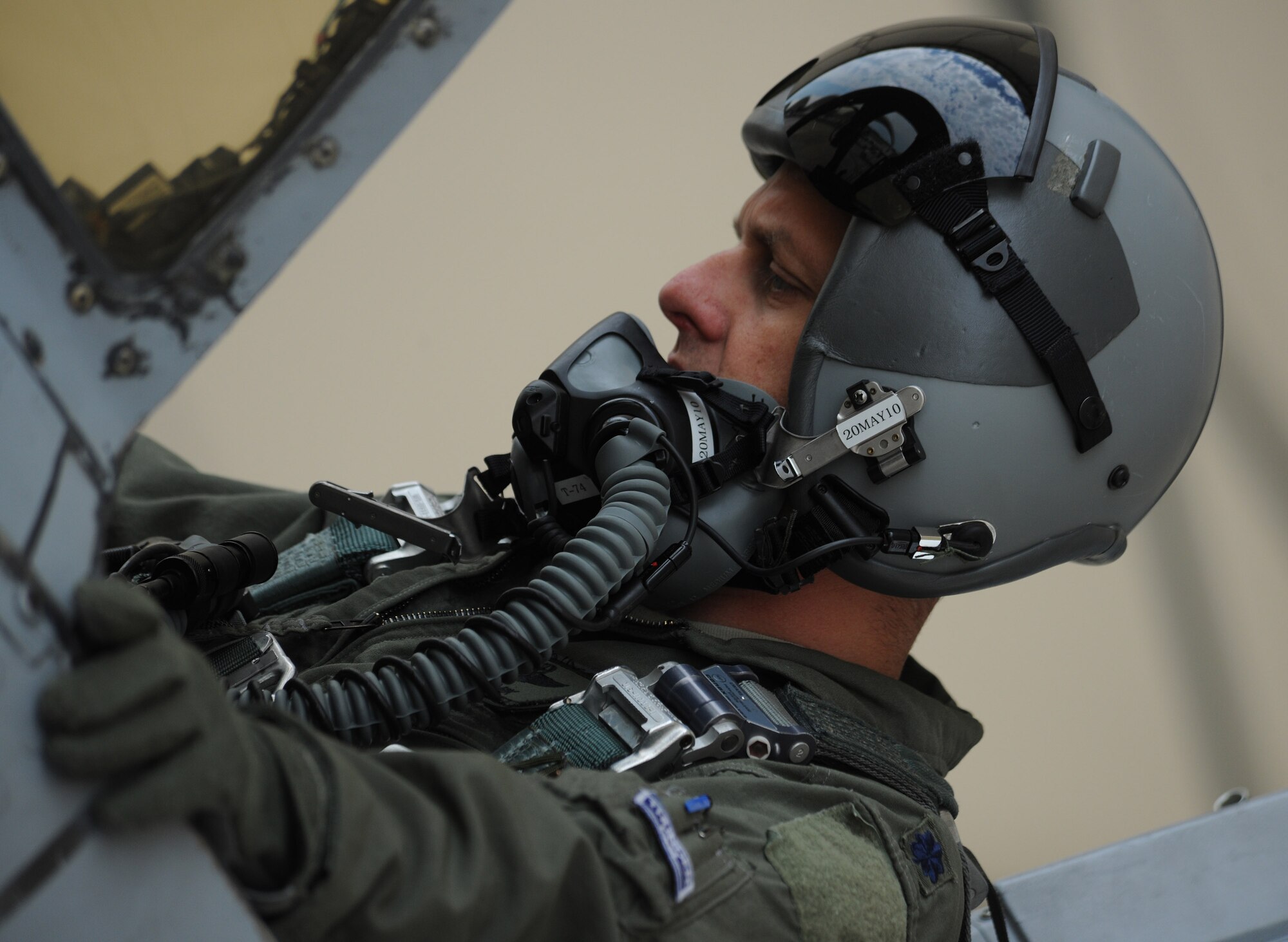MOODY AIR FORCE BASE, Ga. -- Lt. Col. James Clark, 74th Fighter Squadron commander, does his preflight check before take off during a surge operation here April 27. The 74th FS set a goal of flying nearly 140 sorties in three days. (U.S. Air Force photo by Airman 1st Class Benjamin Wiseman/RELEASED)