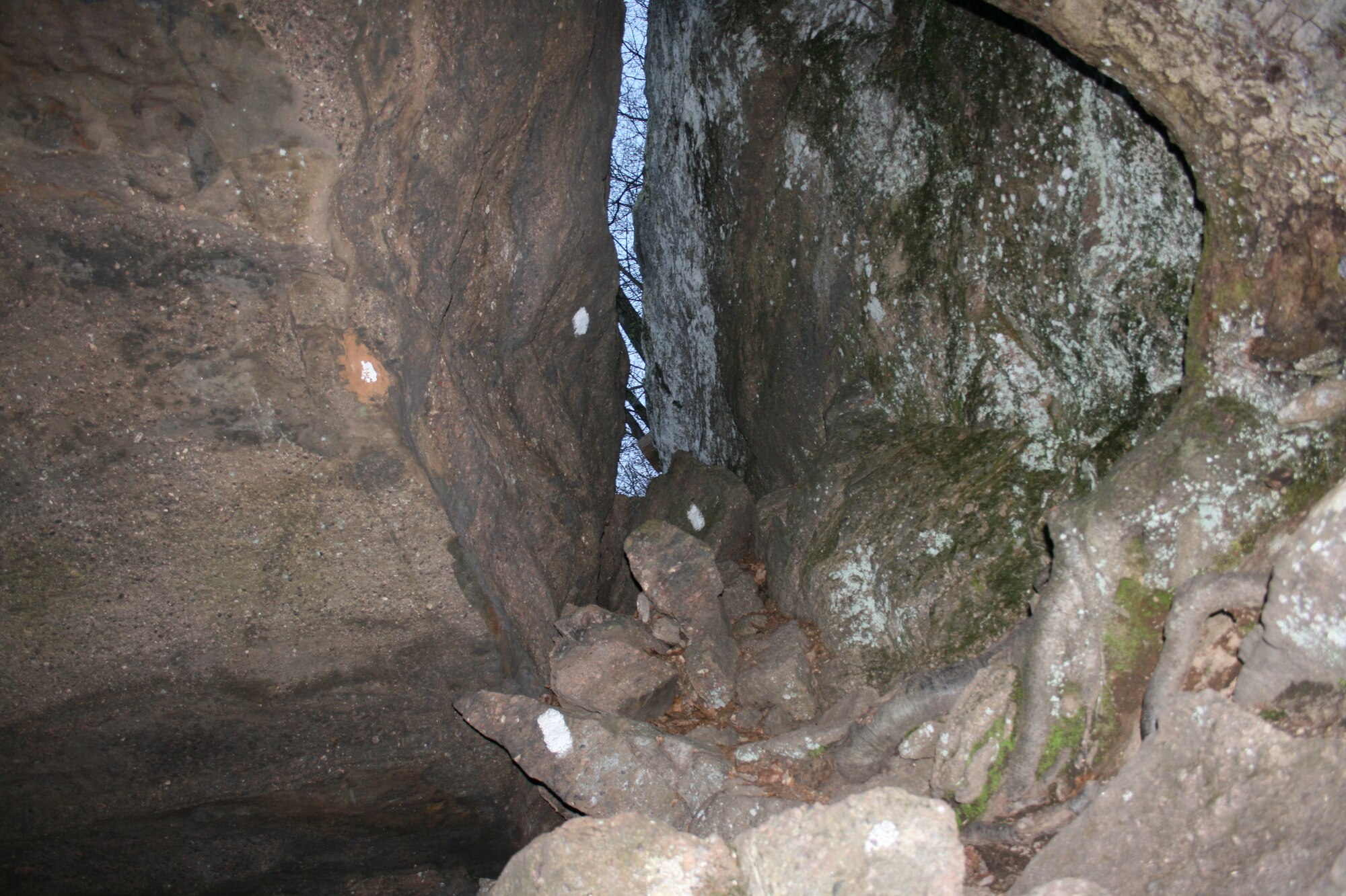 A trek in the Mount Holyoke Range in Western Massachusetts offers beautiful vistas and hidden gems along the way.  Follow the Metacomet-Monadnock trail over the Horse Caves, through this small crevice in the rocks.