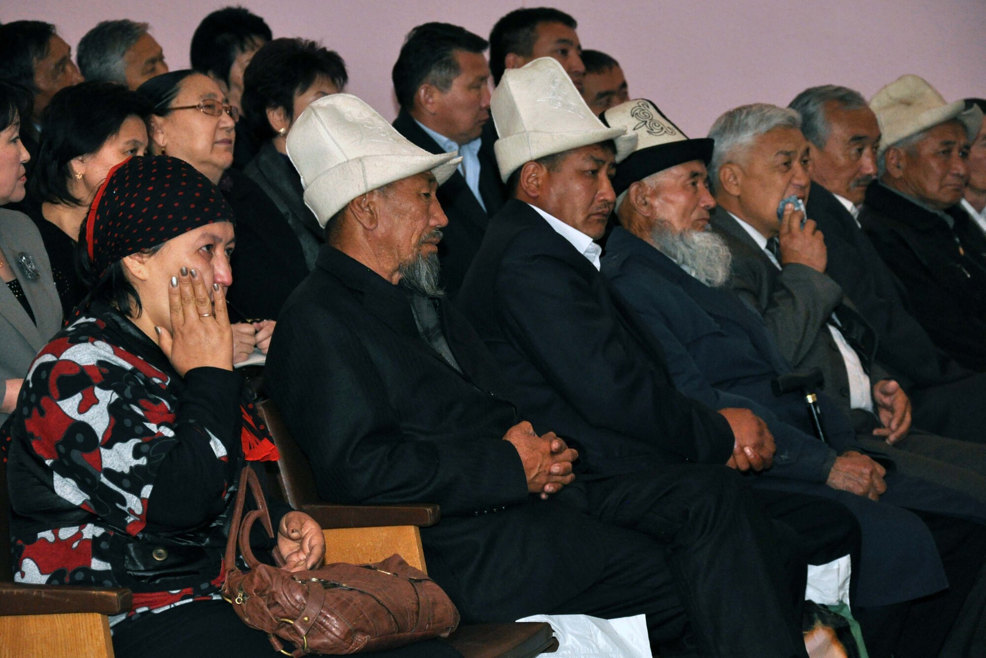 Family members mourn five fallen Kyrgyz men during a ceremony in TokMok April 29, 2010. The men were among many who were slain during recent unrest in Kyrgyzstan. U.S. Airmen attended the ceremony to honor them and donated dry and household goods to assist the surviving family members. (U.S. Air Force photo/Staff Sgt. Carolyn Viss)
