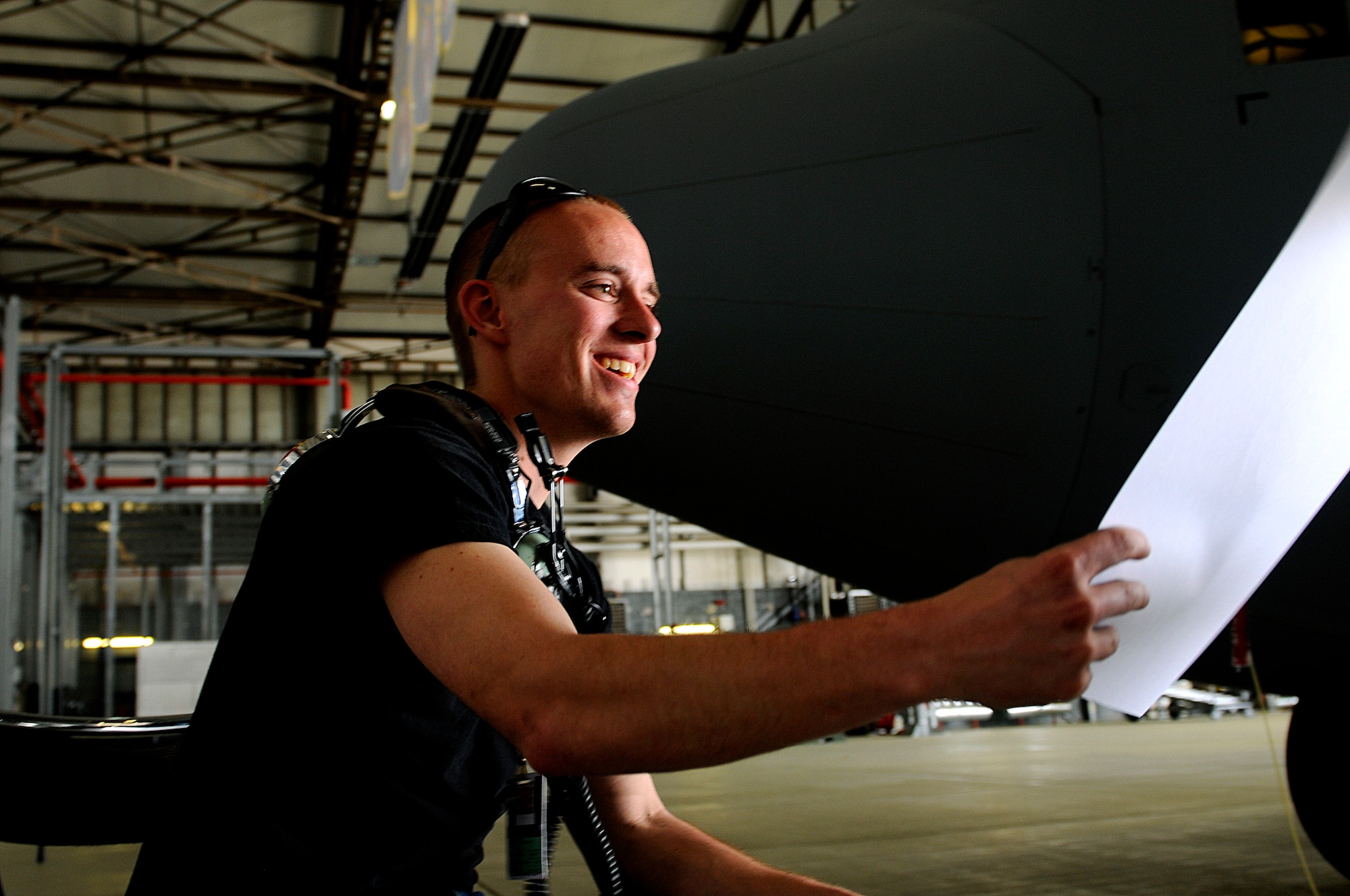 Mr. Ed Steckley, MAD magazine artist for DC comics, shows U.S. Air Force Airmen 1st Class Timothy Nevins, 86th Maintenance Squadron technician, a caricature sketch that he had just drawn,  Ramstein Air Base, Germany, April 29, 2010. Several cartoonists took part in a two-day tour of the Kaiserslautern Military Community, visiting with wounded warriors, military members and their families. (U.S. Air Force photo by Airman 1st Class Brea Miller)