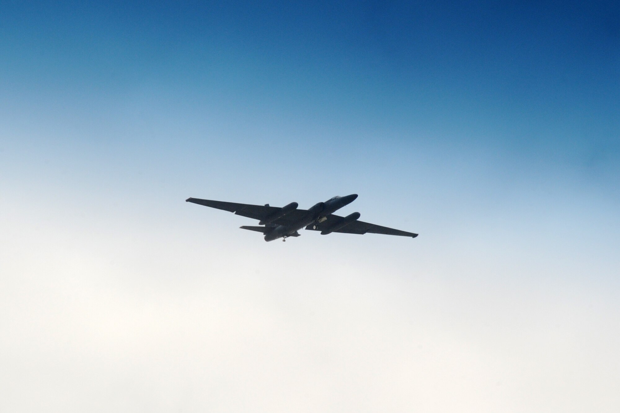 A U-2 Dragon Lady flies over 380th Air Expeditionary Wing at an undisclosed location in Southwest Asia on April 30, 2010. The 380th AEW, supports Operations Iraqi Freedom and Enduring Freedom and the Combined Joint Task Force-Horn of Africa. The 380th AEW is comprised of four groups and 12 squadrons and the wing's deployed mission includes air refueling, surveillance and reconnaissance in support of overseas contingency operations in Southwest Asia. (U.S. Air Force photo/Senior Airman Jenifer H. Calhoun/Released)
