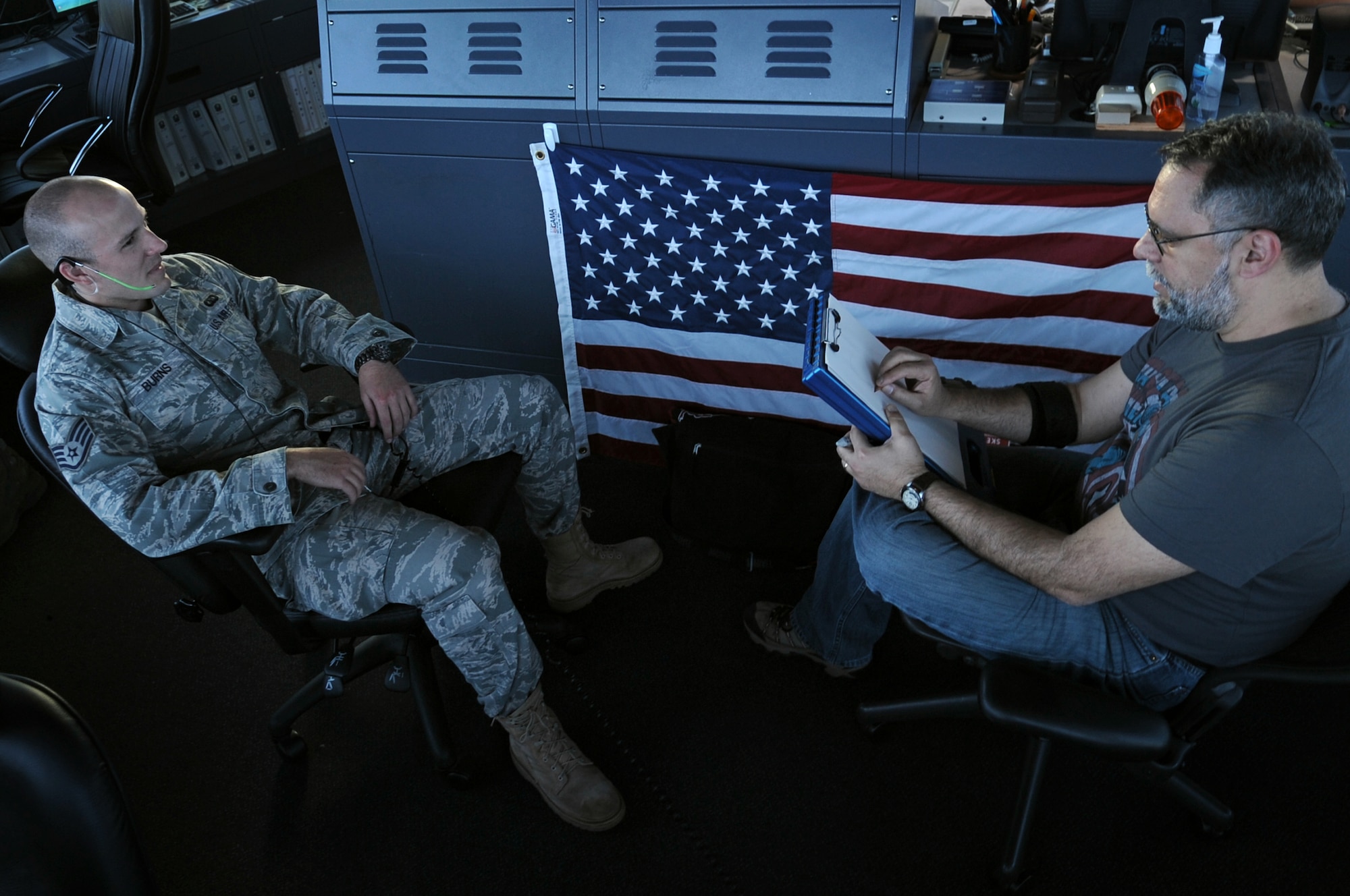Ray Alma, Mad Magazine cartoonist, draws a protrait of U.S. Air Force Airman 1st Class Skyler Burns, 86th Operation Support Squadron air traffic controller, during a United Service Organizations tour, Ramstein Air Base, Germany, April 29, 2010. Several cartoonist took part in a two-day tour of the Kaiserslatuern Military Community, visiting with wounded warriors, military members and their families. (U.S. Air Force photo by Airman 1st Class Grovert Fuentes-Contreras)