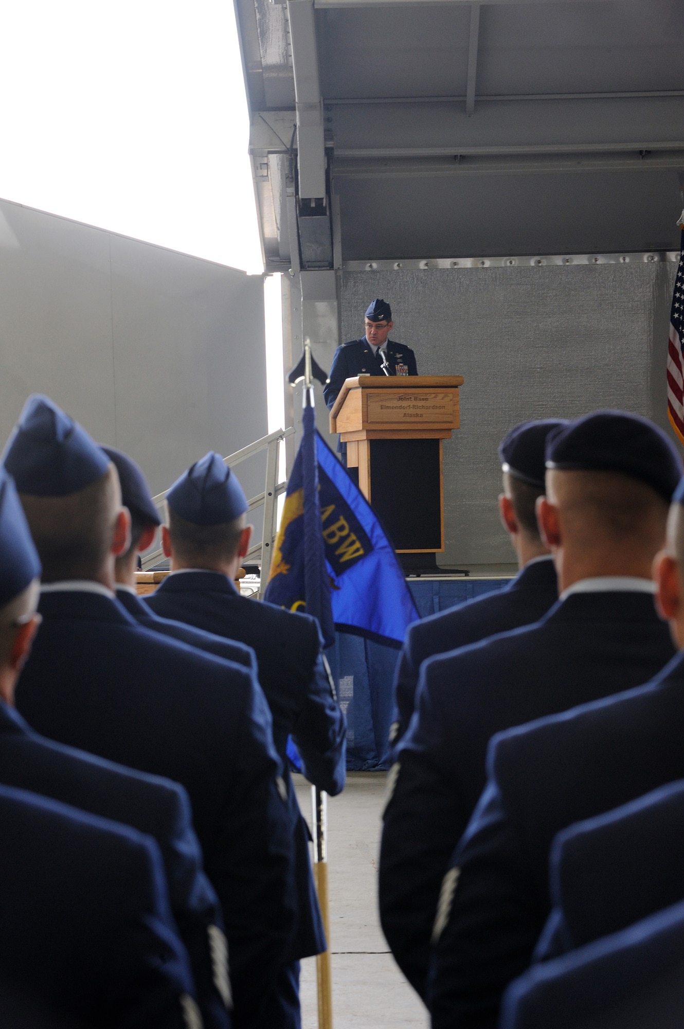 JOINT BASE ELMENDORF-RICHARDSON, Alaska -- Col. Robert D. Evans, commander 673d Air Base Wing (673 ABW), addresses attendees during the unit's activation ceremony July 30. The 673d ABW is the supporting unit for Joint Base Elmendorf-Richardson which is comprised of over 6,000 military, civilian and contractors from both Elmendorf Air Force Base and Fort Richardson Army Garrison near Anchorage, Alaska.  (Air Force photo by Master Sgt. Jeremiah Erickson)