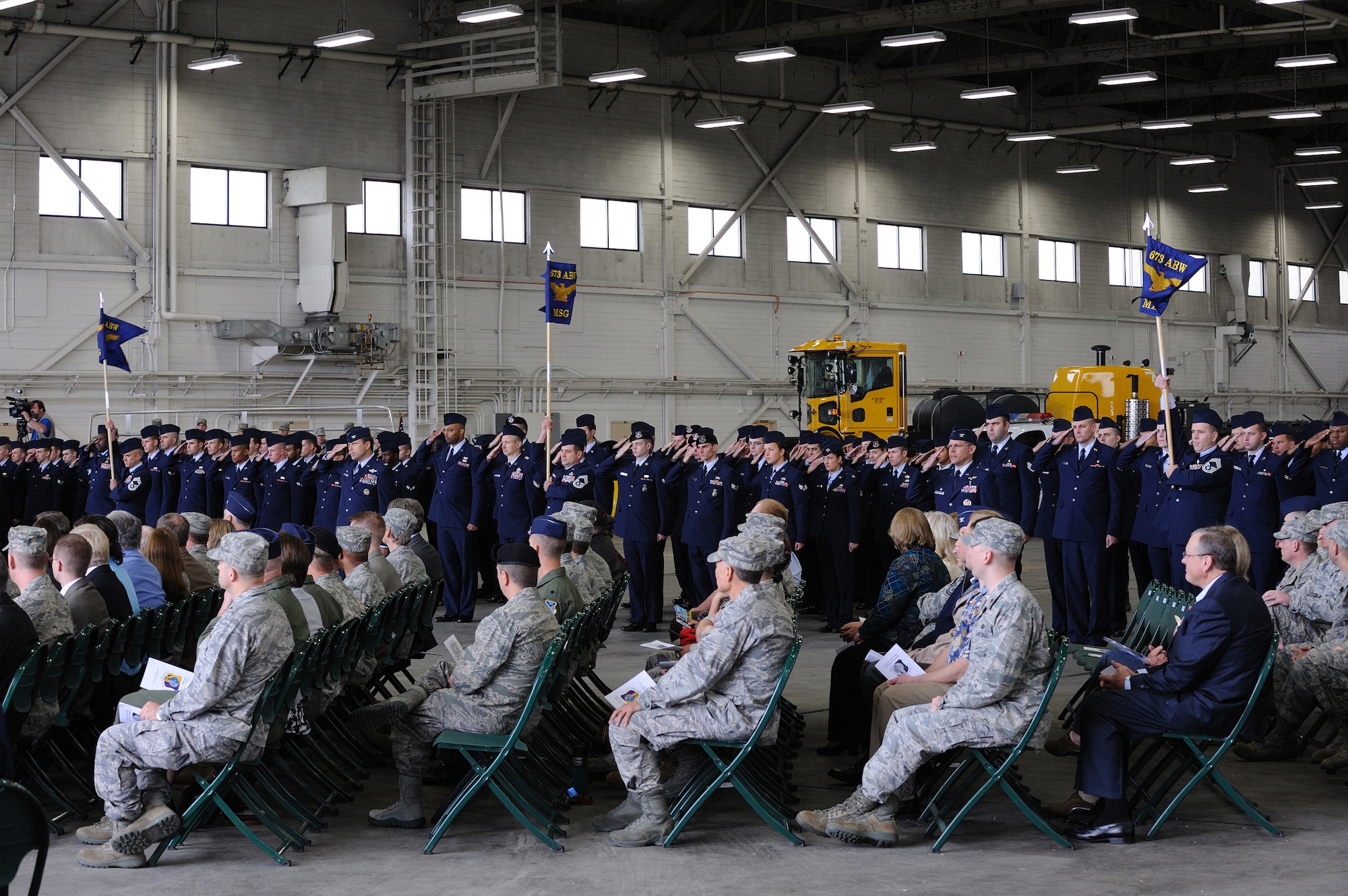 JOINT BASE ELMENDORF-RICHARDSON, Alaska -- Members of the 673d Air Base Wing (673d ABW) render their first salute to the commander during the unit's activation ceremony July 30. The 673d ABW is the supporting unit for Joint Base Elmendorf-Richardson which is comprised of over 6,000 military, civilian and contractors from both Elmendorf Air Force Base and Fort Richardson Army Garrison near Anchorage, Alaska. (Air Force photo by Master Sgt. Jeremiah Erickson)
