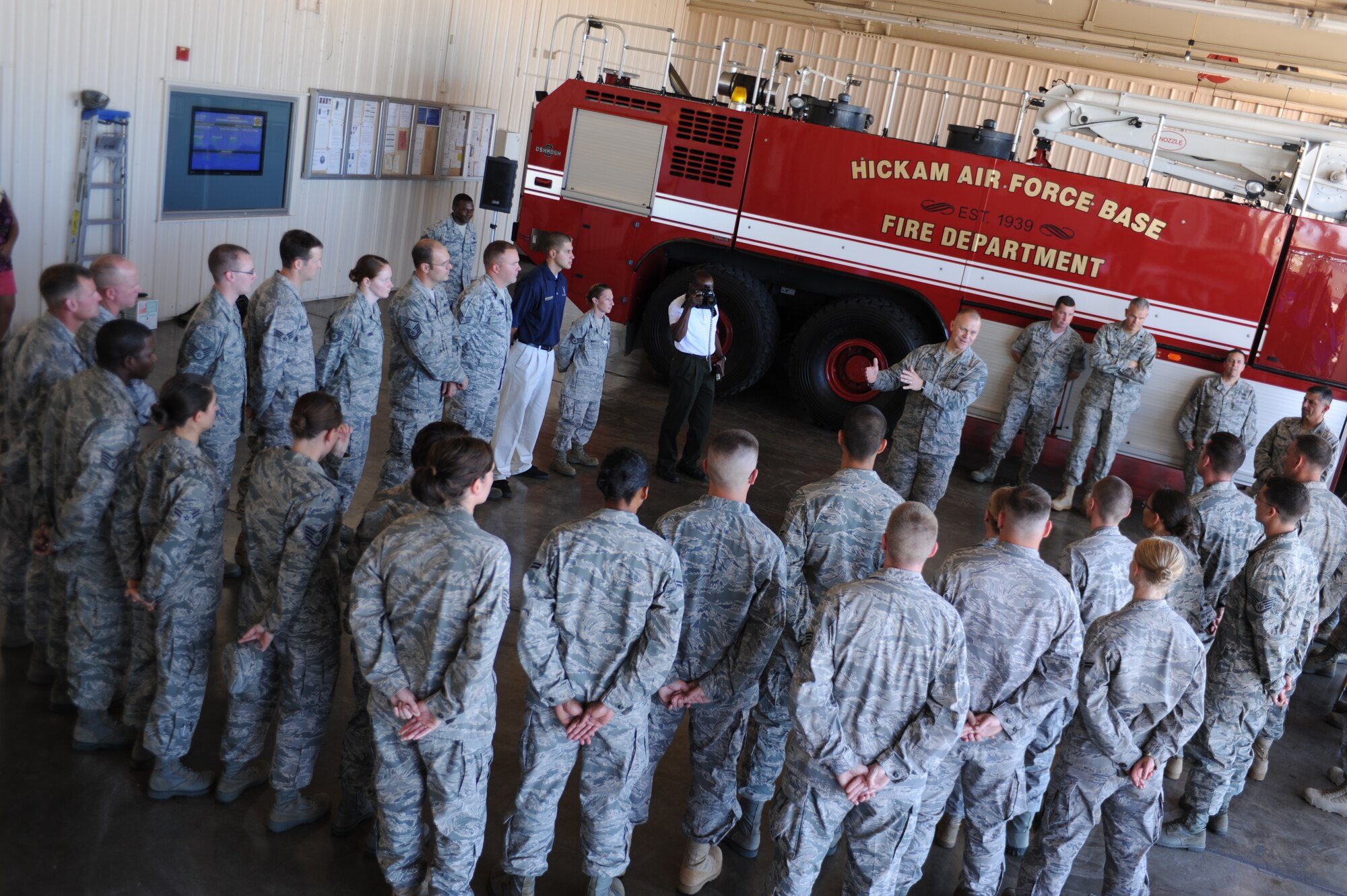 JOINT BASE PEARL HARBOR HICKAM, Hawaii – Chief Master Sgt. of the Air Force James A. Roy speaks to Airmen from the 647th Air Base Group at the Hickam Fire Station here, July 30. Chief Roy visited Hickam for a tour of the base, spoke to Airmen from different organizations, and answered questions concerning Air Force issues. (U.S. Air Force photo/Senior Airman Gustavo Gonzalez)