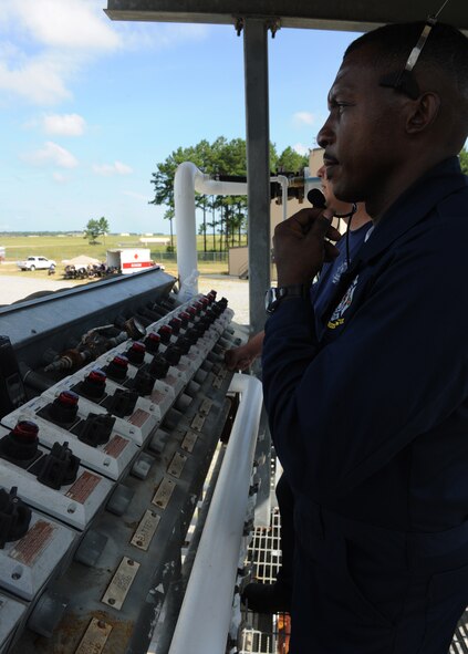 MOODY AIR FORCE BASE, Ga. -- Charlie Johnson, 23rd Civil Engineer Squadron fire emergency services flight assistant training chief, prepares to ignite the training area using a control board during a live fire training exercise here July 27. Mr. Johnson was able to control what sections of the training area would be engulfed with flames. (U.S. Air Force photo by Airman 1st Class Benjamin Wiseman/RELEASED)