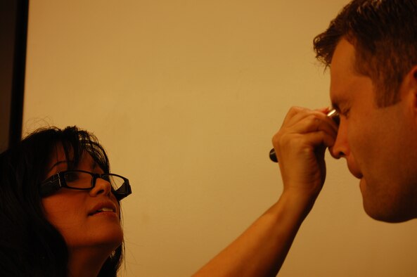 We're sure Jeff's Navy buddies would have a blast with this photo, but even Lt. McClean needed powdered before his national television debut. (USAF photo by Maj. Shannon Mann, 916ARW/PA)