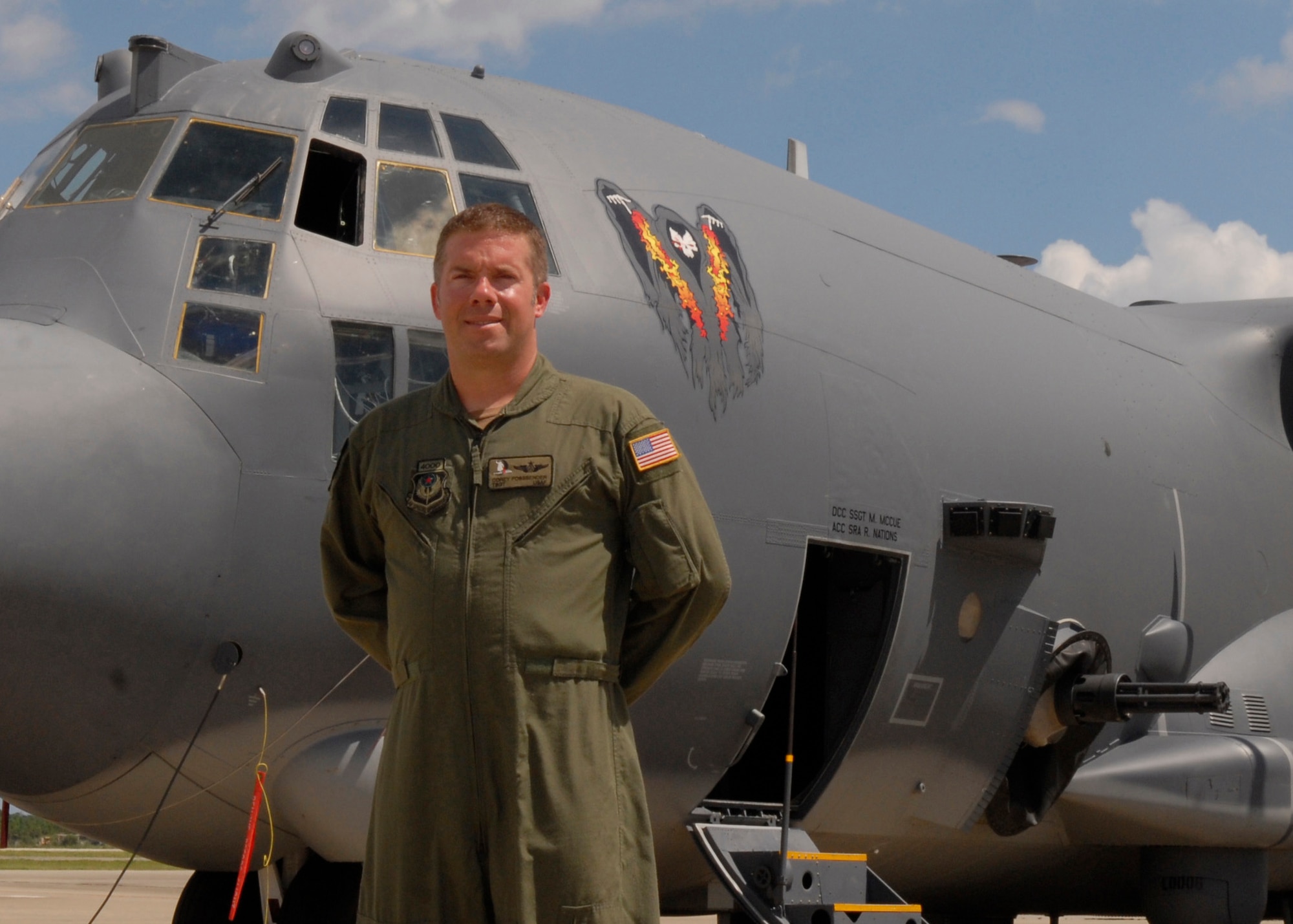 Tech. Sgt. Corey Fossbender, 4th Special Operations Squadron AC-130U Aerial Gunner and Operations Flight NCO in charge, stands next to an AC-130U gunship at Hurlburt Field flightline July 29, 2010. Sergeant Fossbender was selected for this week's "Tip of the Spear" spotlight. ( DoD photo by U.S. Air Force Staff Sgt. Sarah Martinez)

