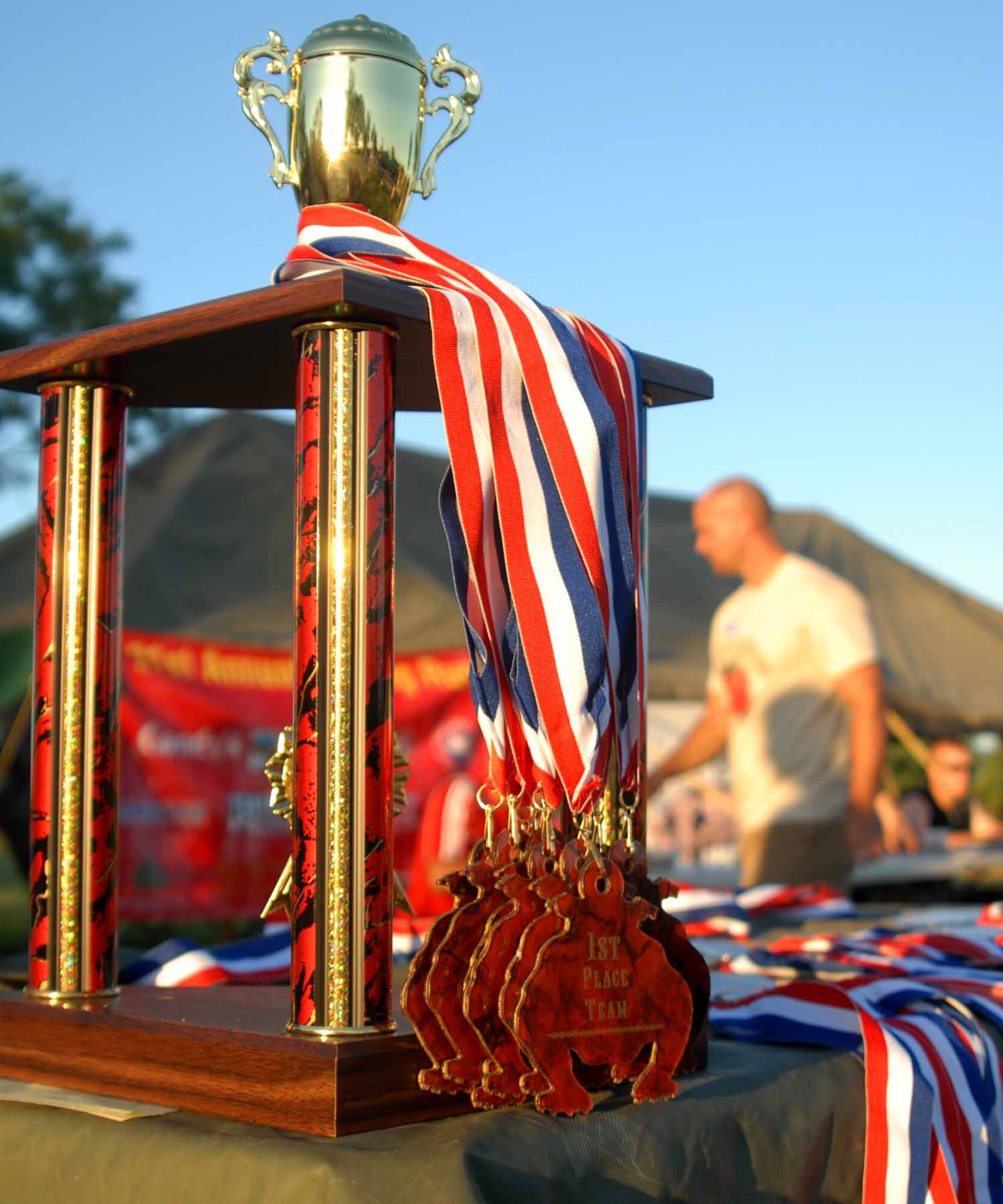 GOODFELLOW AIR FORCE BASE, Texas – The 1st place trophy and medals’ in the shape of a bulldog (U.S. Marine Corp mascot) awaits their new owner, during the 21st Annual Bulldog Run at the Spring Creek RV Camp, July 31. The awards will be presented to the winners in the 10-man 2-mile-team run bracket. (U.S. Air Force photo/ Senior Airman Tong Duong)
