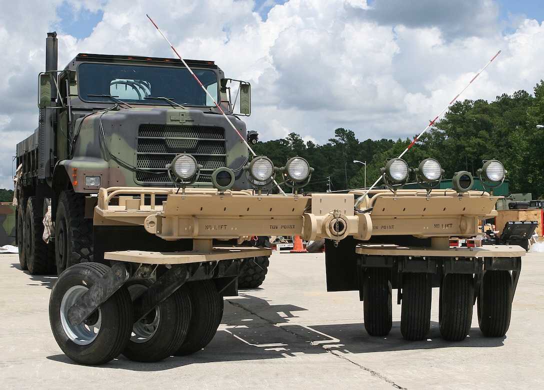 A Panama City Generation III Mine Roller System attached to a 7-ton truck sits in the motor pool of the 10th Marines Engineer lot aboard Marine Corps Base Camp Lejeune, N.C., Aug. 2, 2010. The PC Gen III, a newly upgraded mine roller system that is currently being employed by the Marine Corps in Afghanistan, was attached to several types of tactical vehicles to help teach Marines about the new mine roller system before they are deployed overseas.