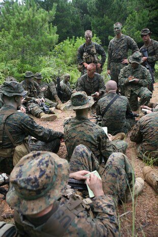 Second Lt. Brett Howard, platoon commander for Combined Anti-Armor Team 1, teaches Marines how to pick alternate positions in case of compromise, August 3. The training prepares Marines for an upcoming deployment with the 31st Marine Expeditionary Unit. (Photo by Lance Cpl. Tyler C. Vernaza)