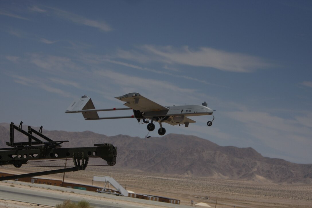 An RQ-7B unmanned aerial vehicle with Marine Unmanned Aerial Vehicle Squadron 3 takes off at the Combat Center's Expeditionary Air Field Aug. 3. The RQ-7B's takeoff is the fruit of the labor of many Marines.