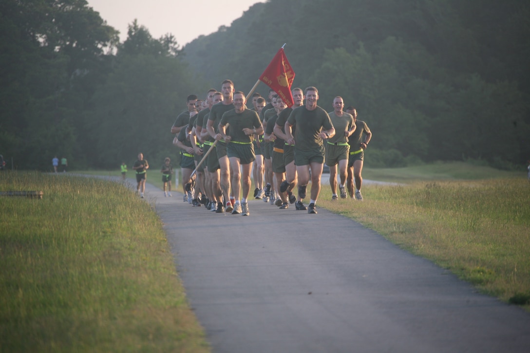Then Brig. Gen. Jon M. Davis, commanding general for 2nd Marine Aircraft Wing, runs in formation with Marine Aerial Refueler Transport Squadron 252 for physical training at the Slocum physical training trail Aug. 3.