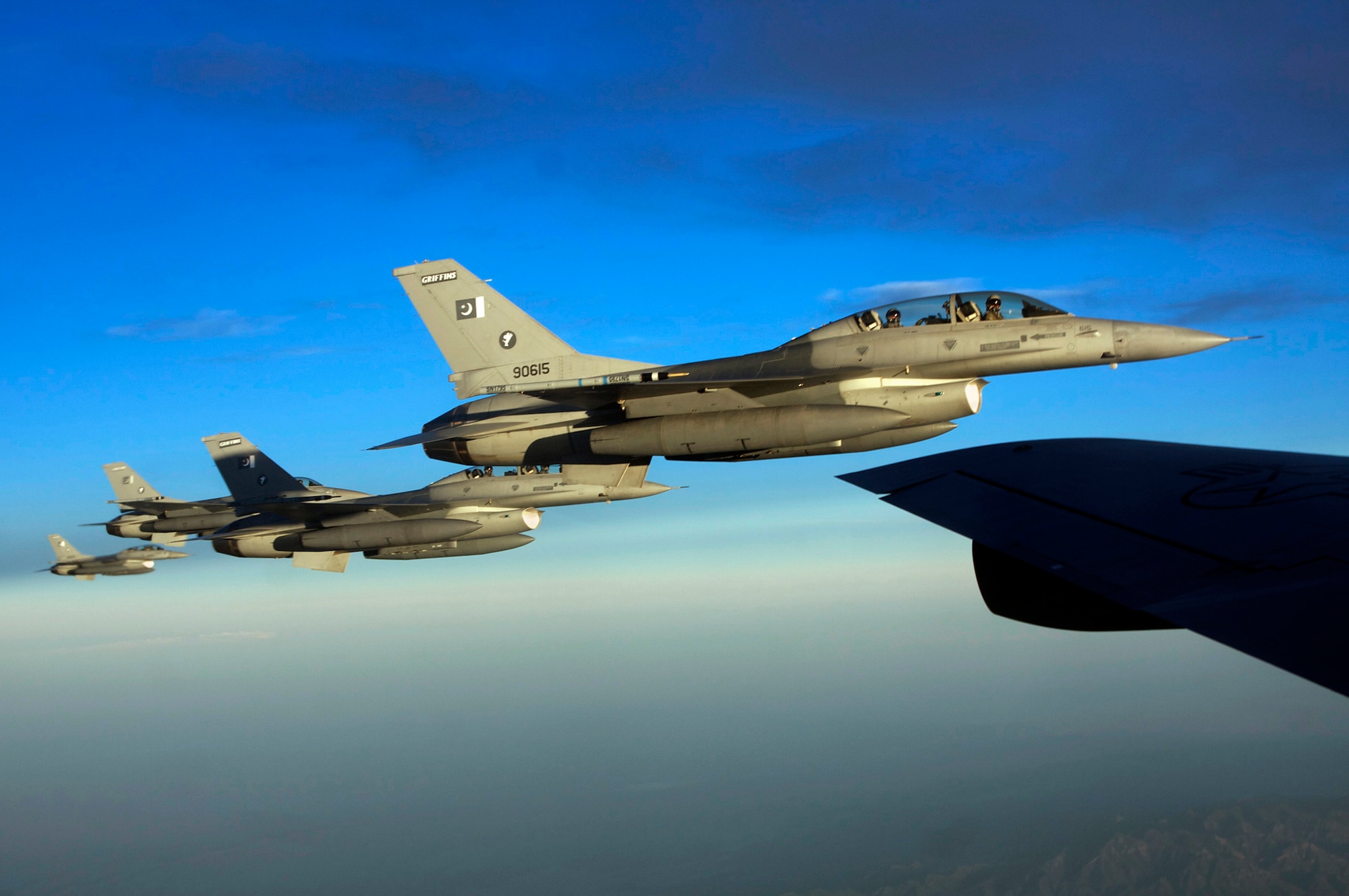 NELLIS AIR FORCE BASE, Nev. -- A four-ship of  F-16 Fighting Falcons from the Pakistan Air Force head to the fight after refueling July 21 during Red Flag 10-4. Red Flag is a realistic combat training exercise involving the air forces of the United States and its allies. The exercise is conducted on the 15,000-square-mile NTTR, north of Las Vegas. (U.S. Navy photo/IT1 Steven Wolff) 



