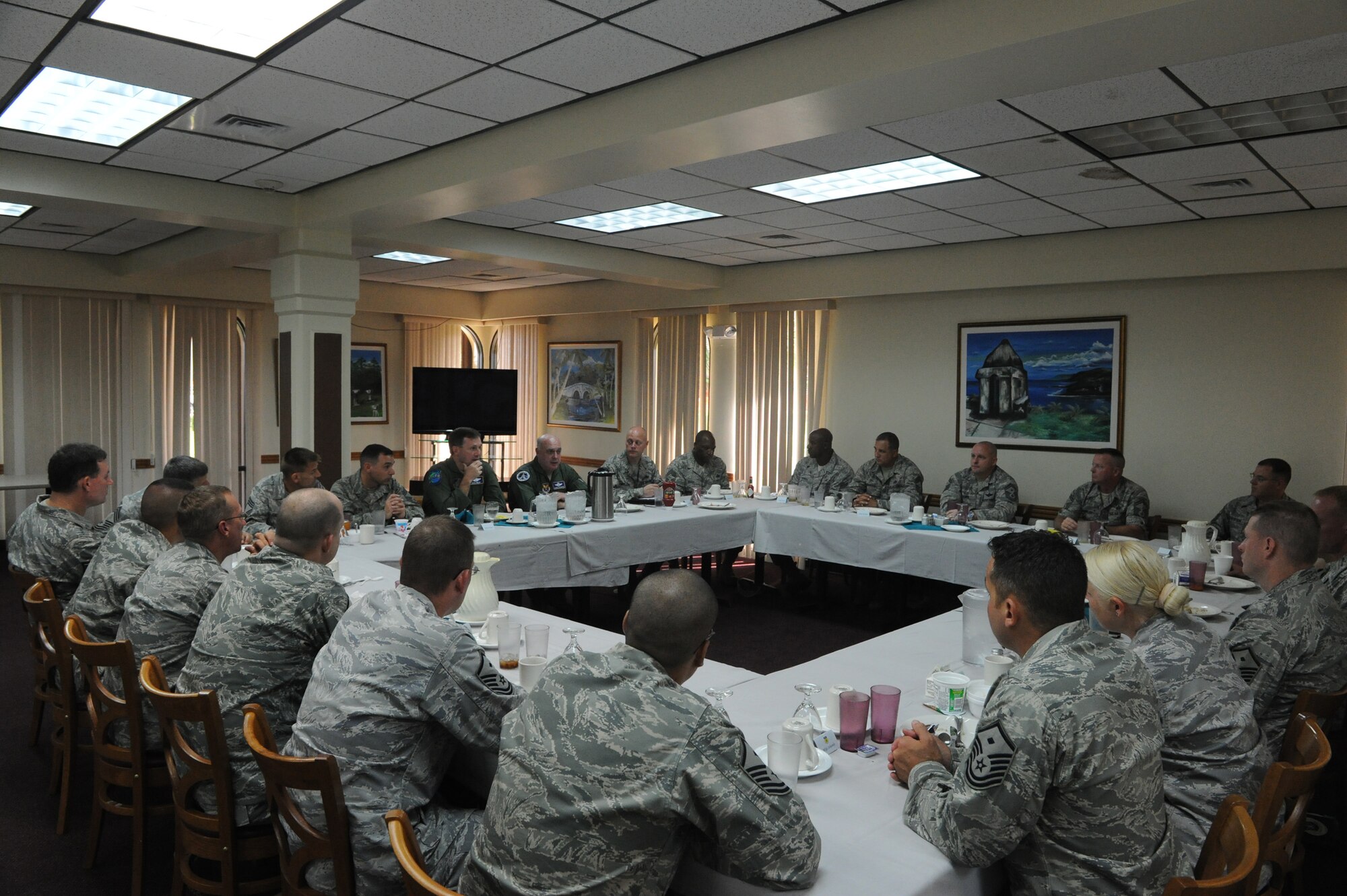 ANDERSEN AIR FORCE BASE, Guam - Air Force Vice Chief of Staff Gen. Carrol ?Howie? Chandler eats breakfast with chief master sergeants and first sergeants at the dining facility at Andersen Air Force Base, Guam, on Aug. 3, 2010.  Topics discussed in the open forum included uniform concerns, fitness and mentorship. General Chandler was accompanied on his visit to Andersen by Pacific Air Forces Vice Commander Maj. Gen. Douglas Owens, a former 36th Wing commander. (U.S. Air Force photo/Tech. Sgt. Mike Andriacco)