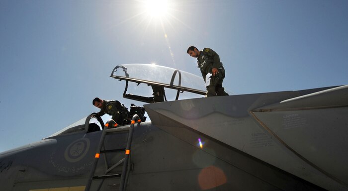 NELLIS AIR FORCE BASE, Nev. --Pilots from the Royal Saudi Air Force pre-flight an F-15S on July 23, 2010 at Nellis Air Force Base, Nev., during Red Flag 10-4. Red Flag is a realistic combat training exercise involving the air forces of the United States and its allies. The exercise is hosted north of Las Vegas on the Nevada Test and Training Range.  (U.S. Air Force photo/ Master Sgt. Kevin J. Gruenwald) 



