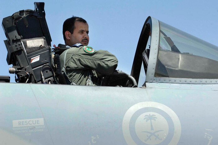 NELLIS AIR FORCE BASE, Nev. -- A pilot from the Royal Saudi Air Force performs a  pre-flight insection on an F-15S, July 23, 2010 at Nellis Air Force Base, Nev., during Red Flag 10.4. Red Flag is a realistic combat training exercise. The exercise is conducted on the 15,000-square mile Nevada Test and Training Range. In addition, to U.S. aircraft, the Royal Saudi, Pakistan and Republic of Singapore Air Forces will also be participating and NATO is providing additional E-3 support. (U.S. Air Force photo/ Master Sgt. Kevin J. Gruenwald)



