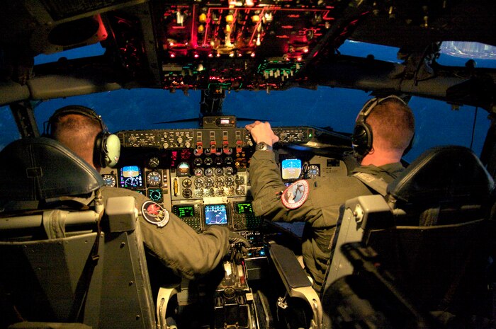 NELLIS AIR FORCE BASE, Nev. -- Crew members from the 22nd Air Refueling Wing, McConnell Air Force Base fly a KC-135 Stratotanker over the Nevada Test and Training Range July 21, 2010.  The 22nd ARW is participating in Red Flag 10-4 held at Nellis. Red Flag is a realistic combat training exercise involving the air forces of the United States and its allies. The exercise is conducted on the 15,000-square-mile NTTR, north of Las Vegas. (U.S. Navy photo/IT1 Steven Wolff) 



