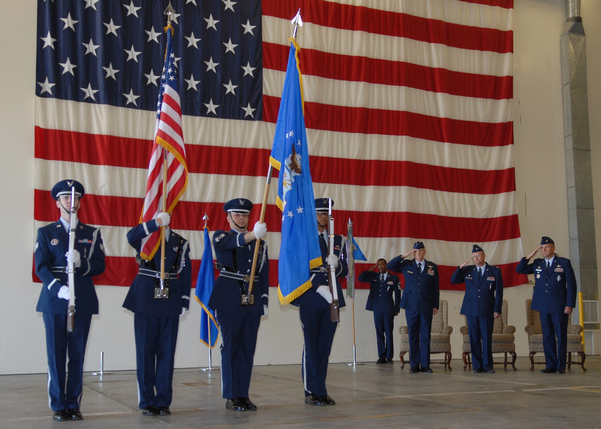 VANDENBERG AIR FORCE BASE, Calif. - Posting the colors, members of the Vandenberg Honor Guard present the flag during the 576th Flight Test Squadron change of command ceremony honoring the incoming commander, Col. David Bliesner, here Monday, Aug. 2, 2010. (U.S. Air Force photo/Senior Airman Antoinette Gibson)