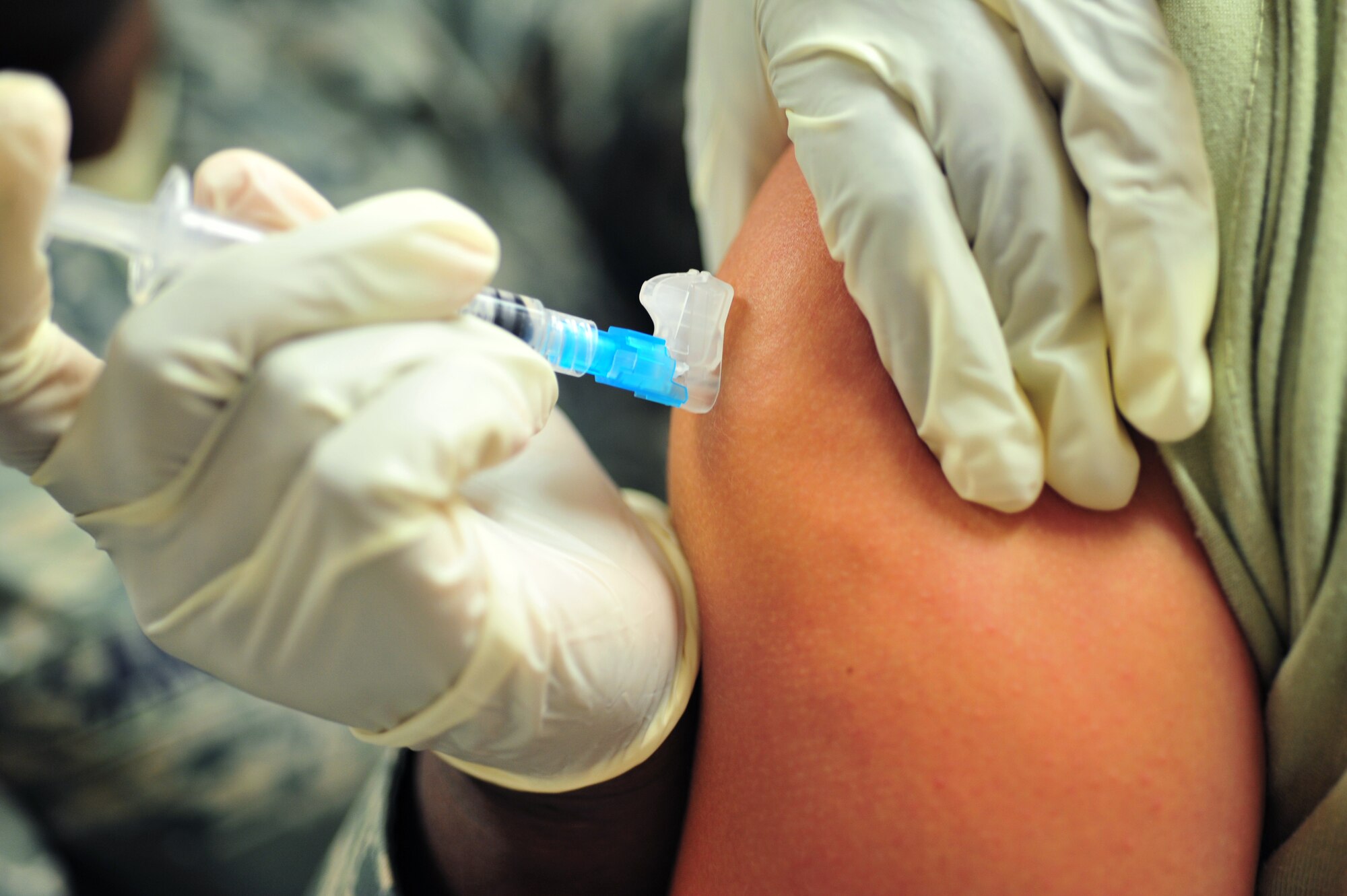 100803-F-8430J-039
SHAW AIR FORCE BASE, S.C. -- Master Sgt. Tracy Sankey, 20th Medical Operations Squadron immunization technician, administers an immunization to the arm of Airman 1st Class Victoria Secrist, 20th Fighter Wing Public Affairs, August 3, 2010. The month of August is National Immunization Awareness Month, which prepares and informs people for the upcoming cold and flu season. Routine immunizations are important in saving lives since they prevent common diseases. (U.S. Air Force photo/Airman 1st Class Amber E. Jacobs)