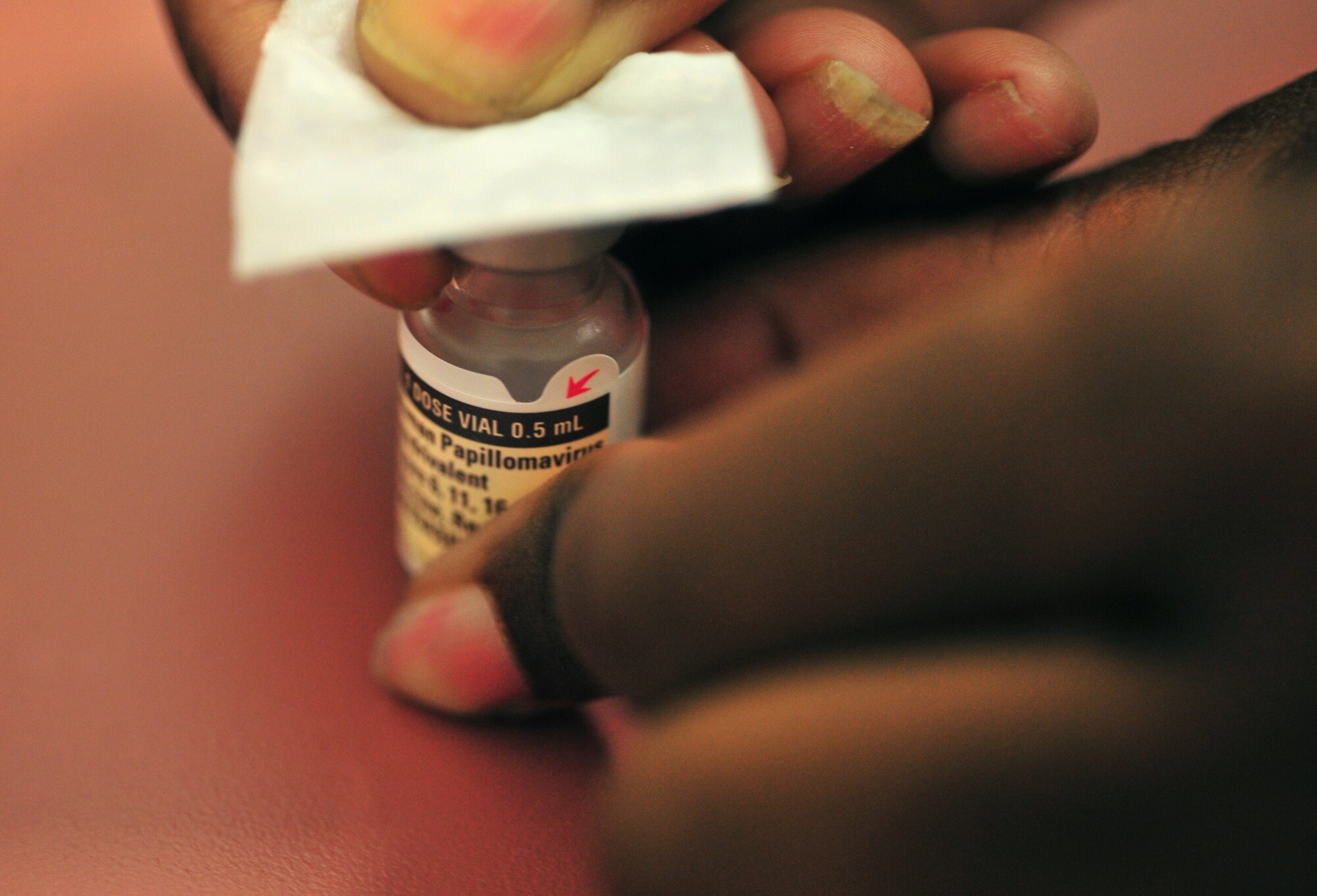 100803-F-8430J-017
SHAW AIR FORCE BASE, S.C. -- Master Sgt. Tracy Sankey, 20th Medical Operations Squadron immunization technician, sterilizes the lid of a vile before  administering  an immunization August 3, 2010. The month of August is National Immunization Awareness Month, which prepares and informs people for the upcoming cold and flu season. Routine immunizations are important in saving lives since they prevent common diseases. (U.S. Air Force photo/Airman 1st Class Amber E. Jacobs)
