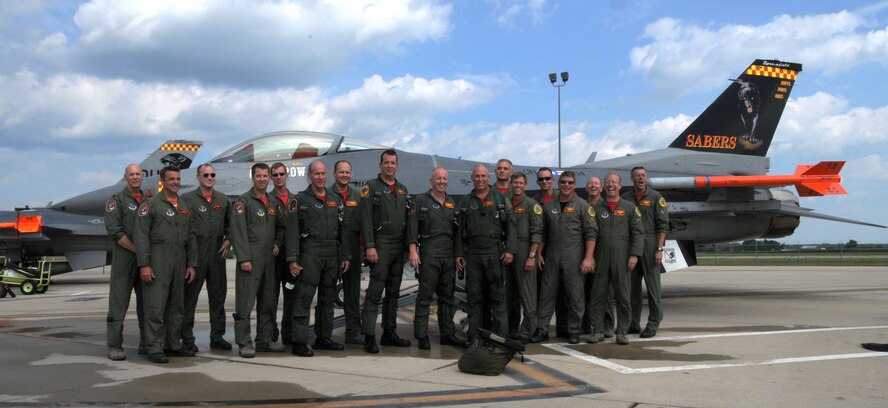 Pilots from the 178th Fighter Wing gather in front of an F-16 July 30 in Springfield, Ohio.  It is the last time these pilots would fly together here at Springfield. (U.S. Air Force photo by SrA Anthony T. Graham)