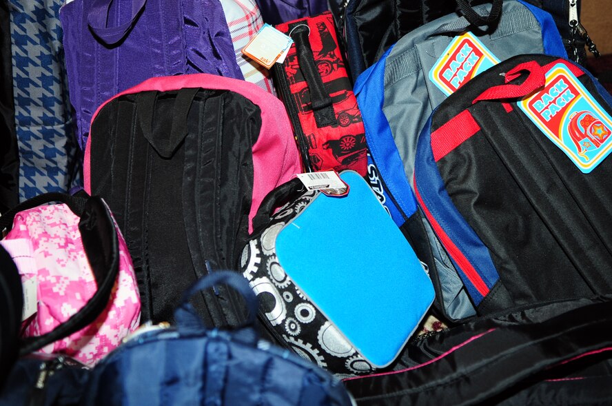 BARKSDALE AIR FORCE BASE, La. – Guests at the Operation School Days event were awarded back-packs filled with school supplies as door prizes at Hoban Hall August 2. The evening’s events also included speeches by members of the Bossier and Caddo Parish school districts, a school uniform fashion show and time for parents to view displays provided by more than 50 local schools. (U.S. Air Force photo by Senior Airman Joanna M. Kresge)