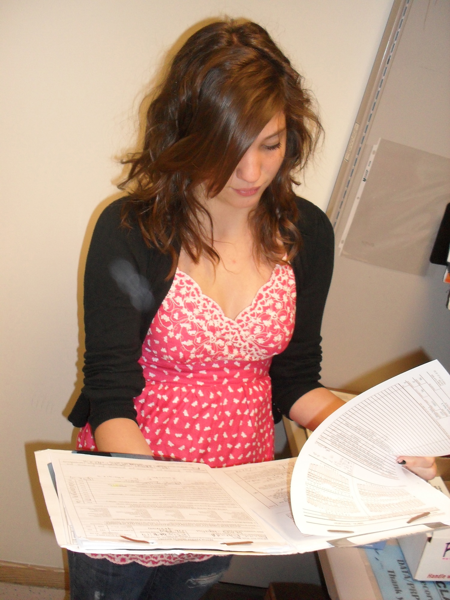 Elizabeth Marquardt files records July 30 at the 48th Medical Group Dental clinic. Elizabeth is a Lakenheath High School student participating in the summer hire program, which allows students to work at various base agencies. (U.S. Air Force photo/Cassandra Coleman)