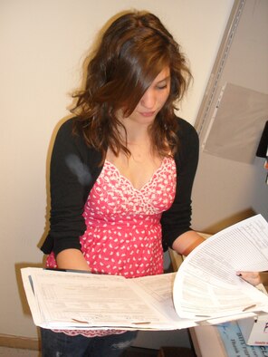 Elizabeth Marquardt files records July 30 at the 48th Medical Group Dental clinic. Elizabeth is a Lakenheath High School student participating in the summer hire program, which allows students to work at various base agencies. (U.S. Air Force photo/Cassandra Coleman)