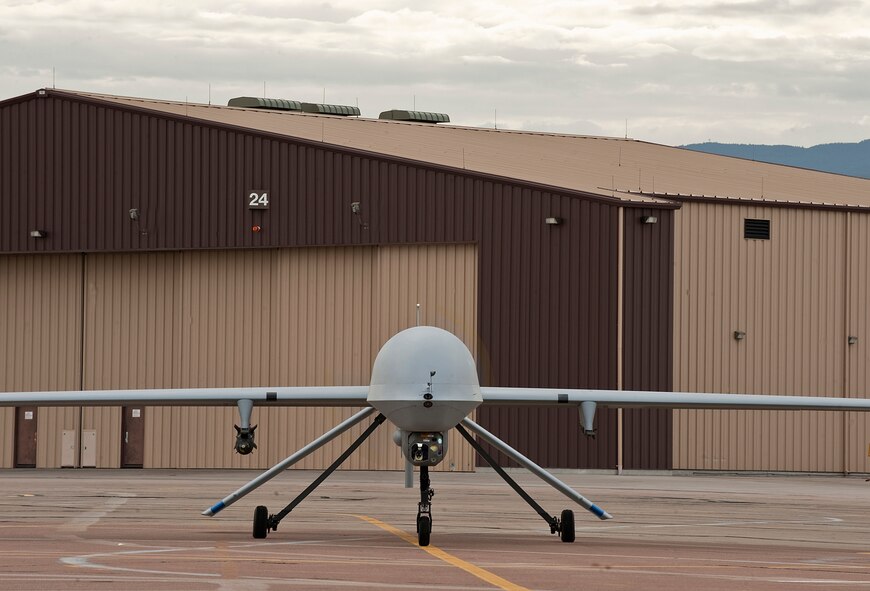 HOLLOMAN AIR FORCE BASE, N.M. -- An MQ-1 Predator prepares to taxi to the runway for takeoff June 7, 2010. Remotely Piloted Aircraft pilots were recently given a glimpse into their field's future by Brig. Gen. David Goldfein, Director of Air and Space Operations, Headquarters Air Combat Command, when he visited the base and conducted two briefings at the base theater. General Goldfein outlined the RPA operator's current situation and his proposals to top Air Force leaders to normalize RPA operations. (U.S. Air Force photo by Senior Airman DeAndre Curtiss / Released)