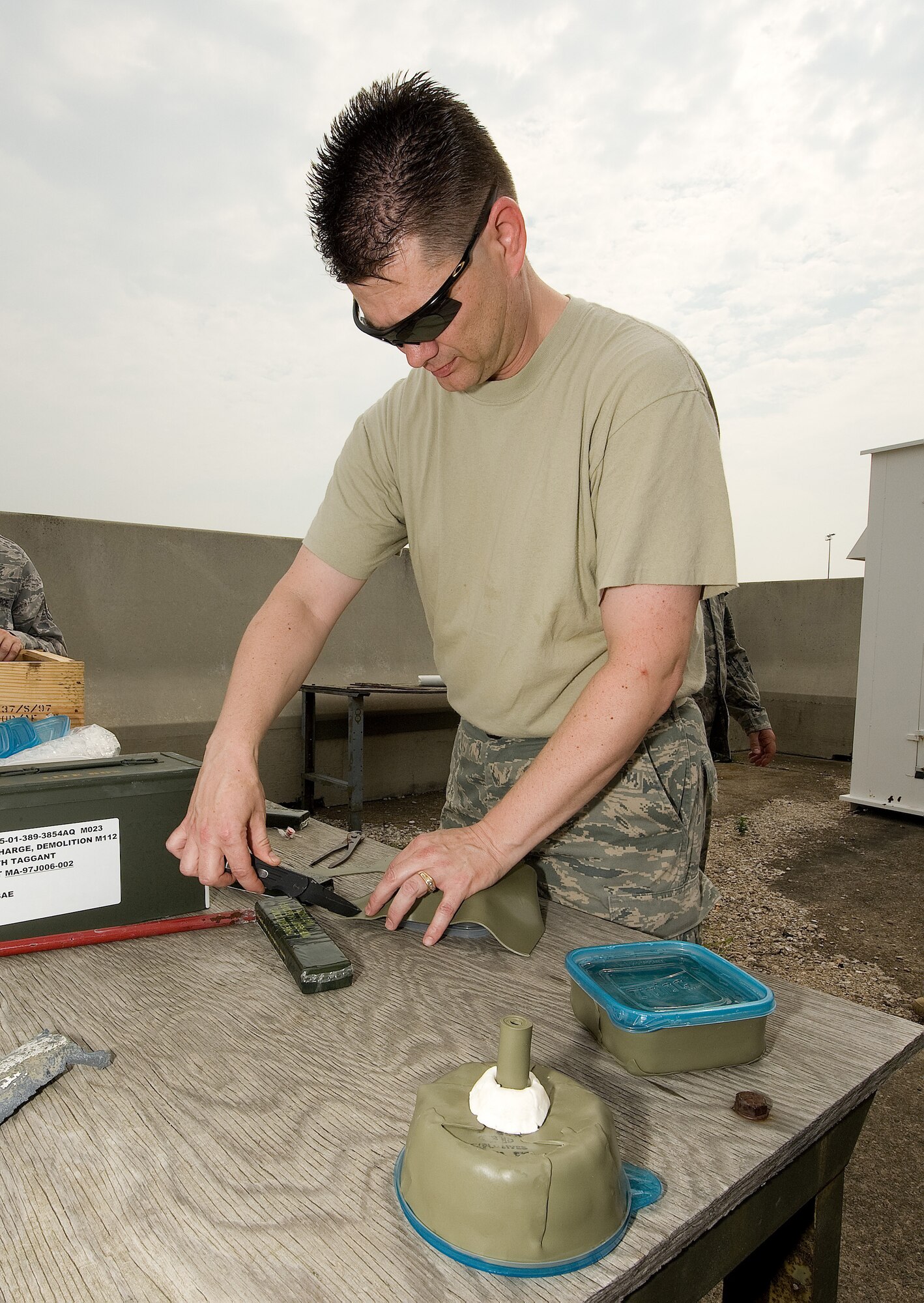 Staff Sgt. Christopher Erickson, 512th Civil Engineer Squadron Explosive Ordnance Disposal Flight technician, prepares deta sheet in order to prime a water charge for demolition at the EOD range here, July 29. Sergeant Erickson is one of seven reservists assigned the 512th EOD Flight. (U.S. Air Force photo/Jason Minto) 