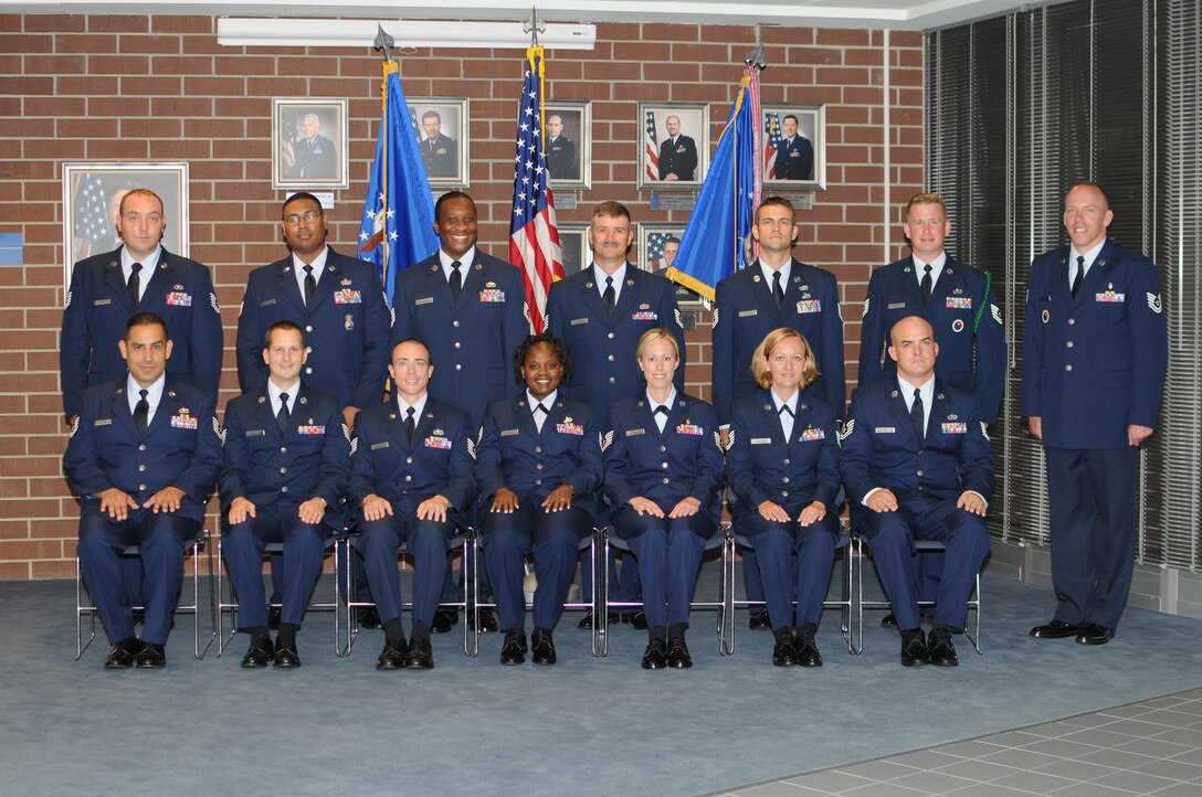 McGHEE TYSON AIR NATIONAL GUARD BASE, Tenn. -- NCO Academy Class 10-7, H-Flight, gathers at The I.G. Brown Air National Guard Training and Education Center here, July 12, 2010. Pictured (L-R sitting) are Tech. Sgt. Richard R. Alvarez; Tech. Sgt. Christopher G. Harris; Tech. Sgt. Bryan C. Mayo; Tech. Sgt. Evryne Hogan; Tech. Sgt. Gina R. Frey; Tech. Sgt. Alicia D. Fletcher; Tech. Sgt. Jeffrey J. Lee; (L-R standing) Tech. Sgt. Travis R. Smith; Tech. Sgt. Christopher N. Lawton; Tech. Sgt. Ian E. Thompkins; Tech. Sgt. Readus L. Hudson, III; Tech. Sgt. Patrick J. O?Reilly; Tech. Sgt. Scott J. Frazier; and Tech. Sgt. Paul Evans, instructor. (U.S. Air Force photo by Master Sgt. Kurt Skoglund/Released)