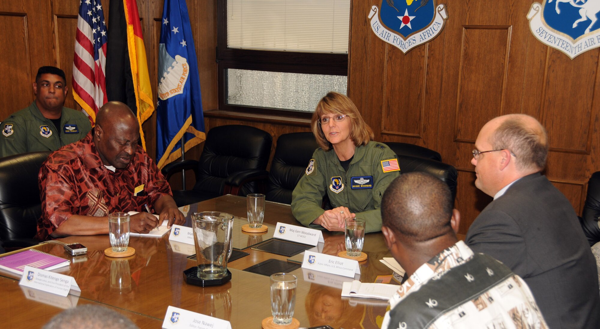 RAMSTEIN AIR BASE, Germany -- 17th Air Force Commander Maj. Gen. Margaret
Woodward (center) discusses the mission of Air Forces Africa with members of
the news media visiting from the Democratic Republic of the Congo July 28
here. Also taking part in the discussion are (from left to right) Col.
Michael Wormely, director of 17 AF's Strategy, Plans, Programs and
Requirements; Mankenda Voka, editor of L'Observateur; Jose Nawej, editor of
Forum des As; and Eric Elliott, U.S. Africa Command Public Affairs. The
visit was one of a series of Africa media delegations being hosted by U.S.
Africa Command, headquartered at Stuttgart, to increase understand of the
mission of the command and its components. (U.S. Air Force photo by Master
Sgt. Jim Fisher) 
