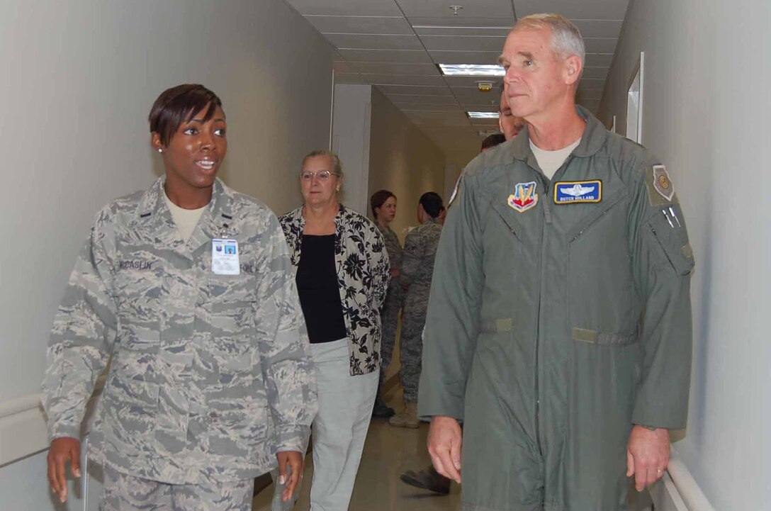 LANGLEY AIR FORCE BASE, Va.—1st Lt. Avis McCaslin of the 633 Medical Operations Squadron briefs Maj. Gen. William L. Holland, 9th Air Force commander, July 30.  Gen. Holland toured the hospital during his three-day  visit to Joint Base Langley-Eustis .  (U.S. Air Force Photo/Master Sgt. Anna Hayman)