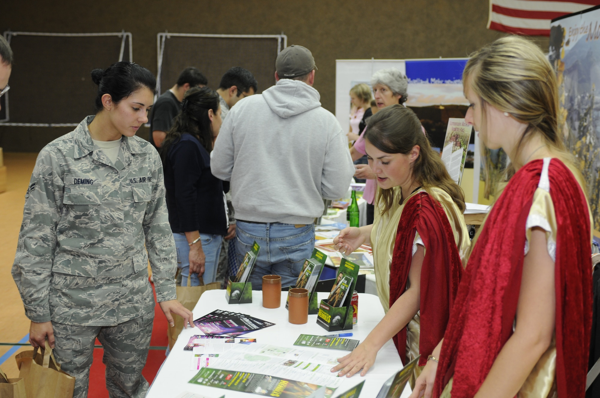 At this year’s Explore the Eifel fair, two Roman ladies provided information on the upcoming Bread and Games gladiator shows in Trier Aug. 13-15. People can obtain additional information on the shows by going to the website www.brotundspiele-trier.de. (U.S. Air Force photo/Senior Airman Clay Murray)